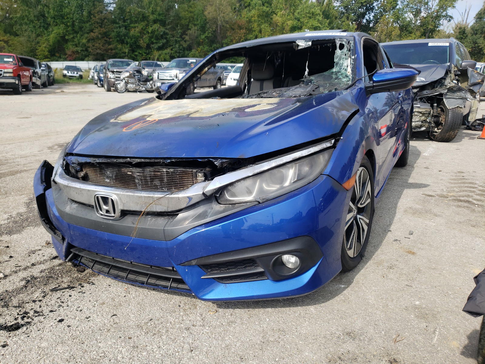 Photo 2 from auction – 2016 HONDA CIVIC EX with VIN 2HGFC3B35GH359104