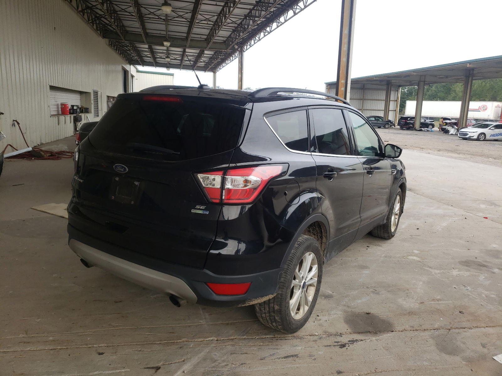 Photo 4 from auction – 2018 FORD ESCAPE SE with VIN 1FMCU9GD4JUC40396
