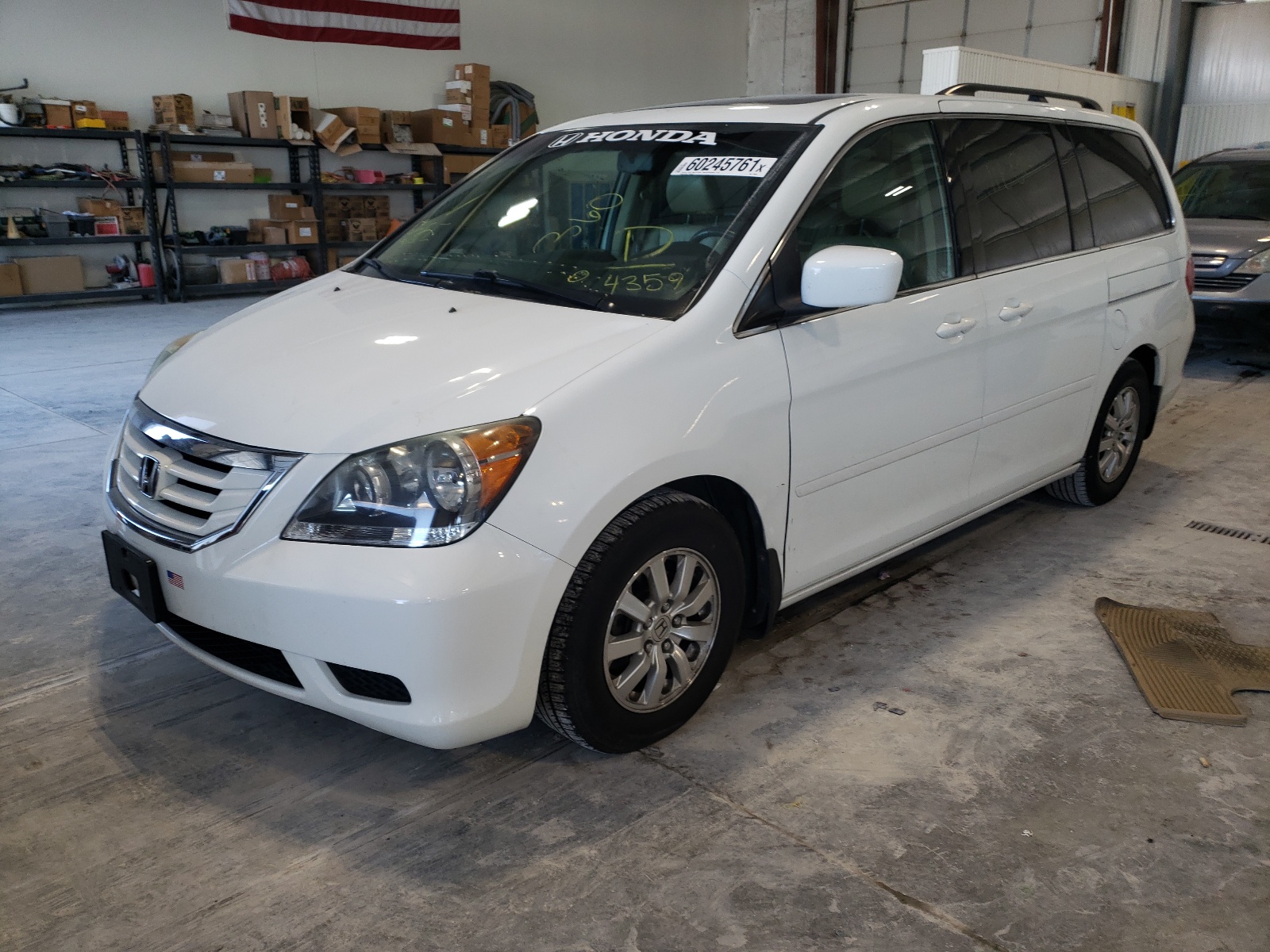 Photo 2 from auction – 2010 HONDA ODYSSEY with VIN 5FNRL3H67AB084359