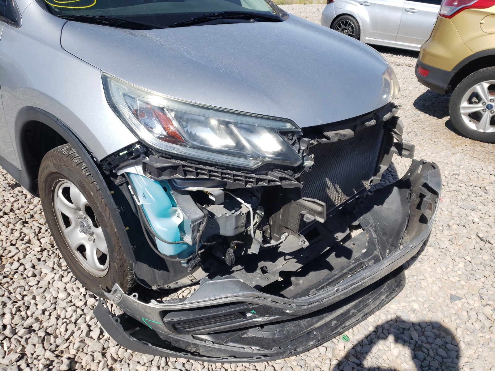 Photo 9 from auction – 2015 HONDA CR-V LX with VIN 3CZRM3H33FG703988