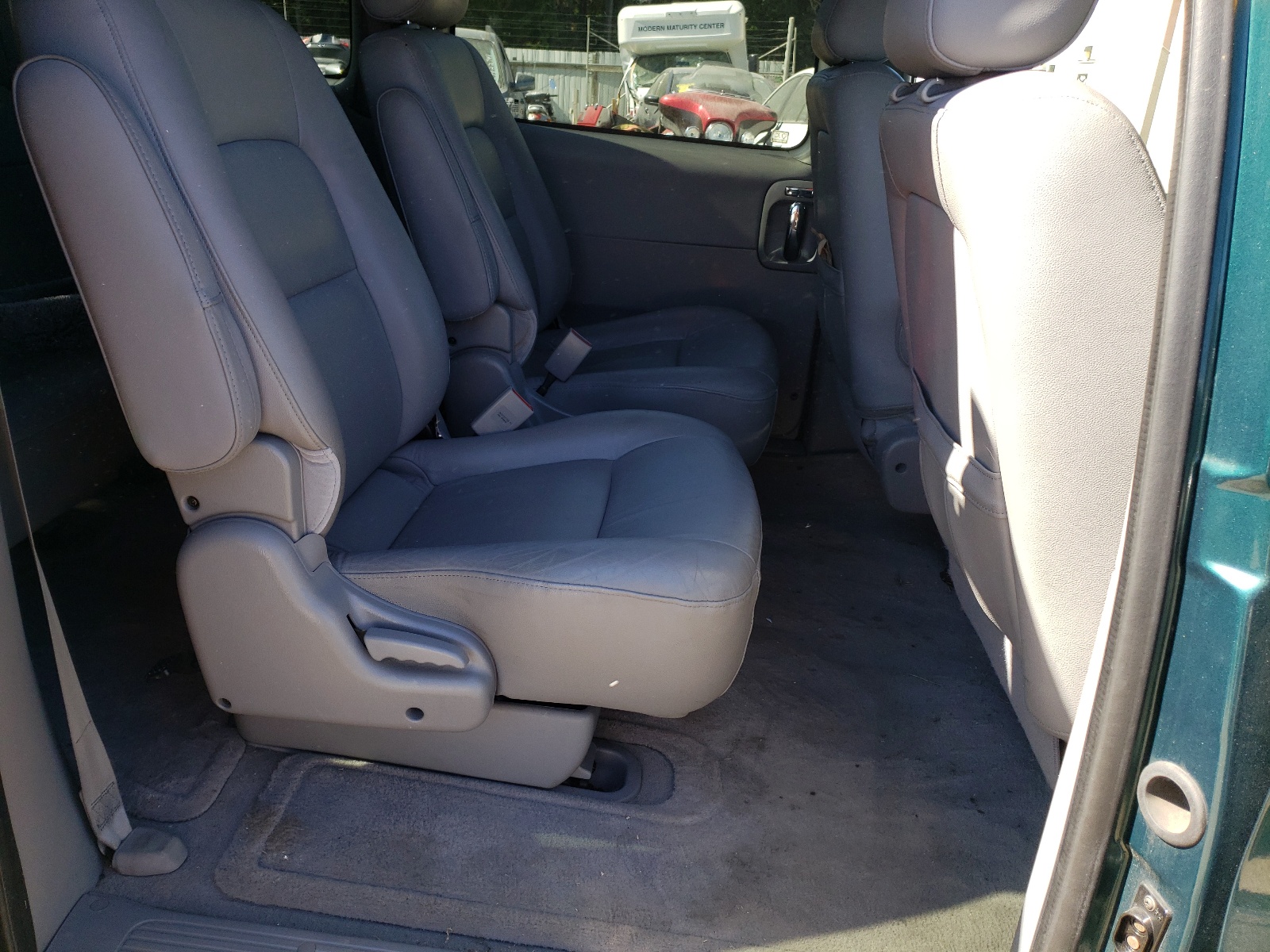 Photo 6 from auction – 2005 KIA SEDONA EX with VIN KNDUP132456671417