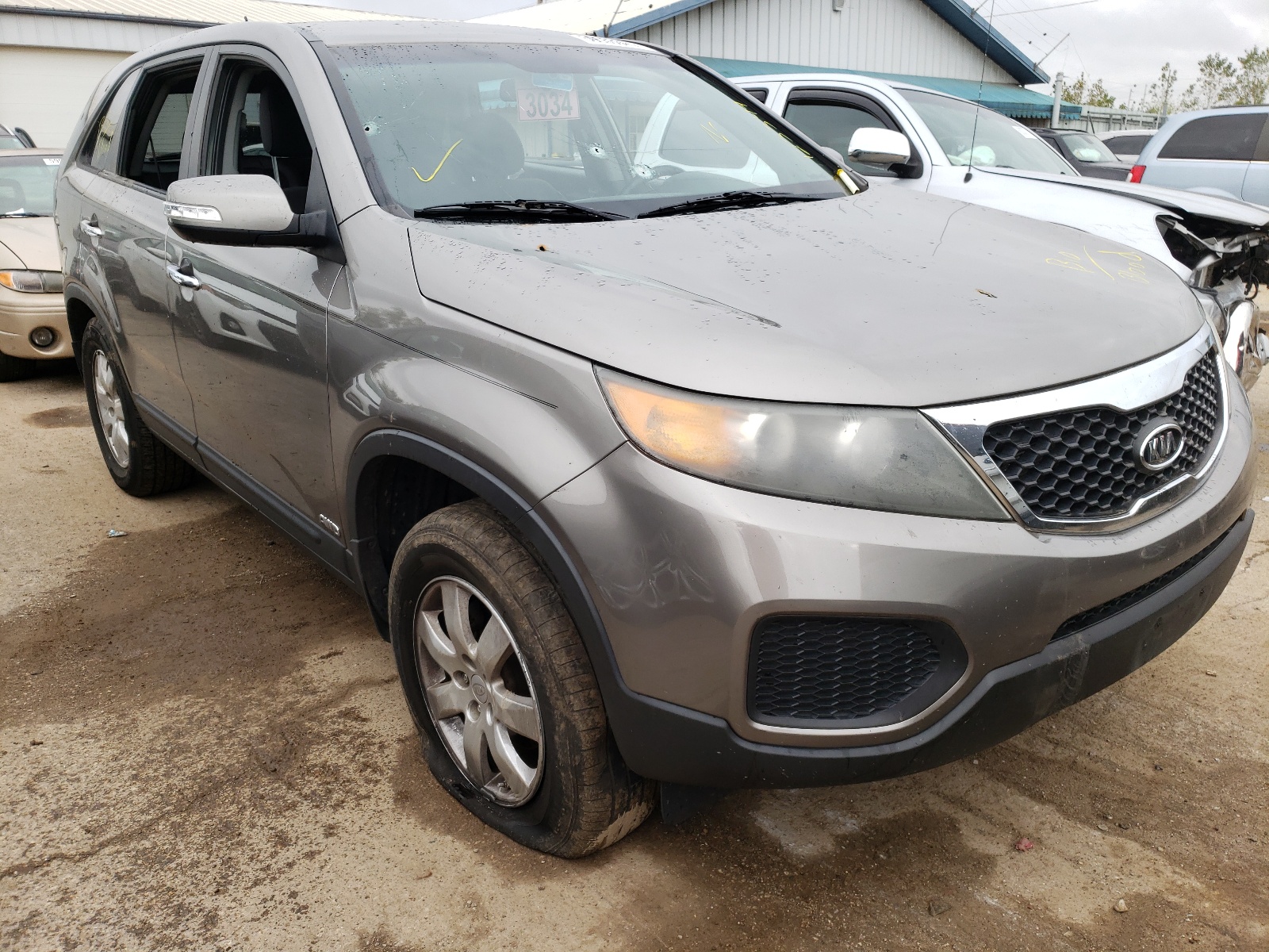 KIA SORENTO BA 2011 with VIN 5XYKTCA11BG123344 - Photo from auction