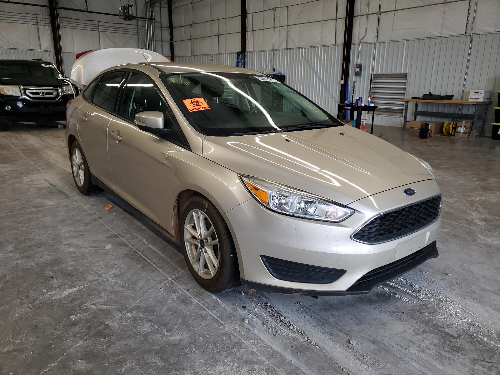 FORD FOCUS SE 2017 with VIN 1FADP3F23HL281573 - Photo from auction