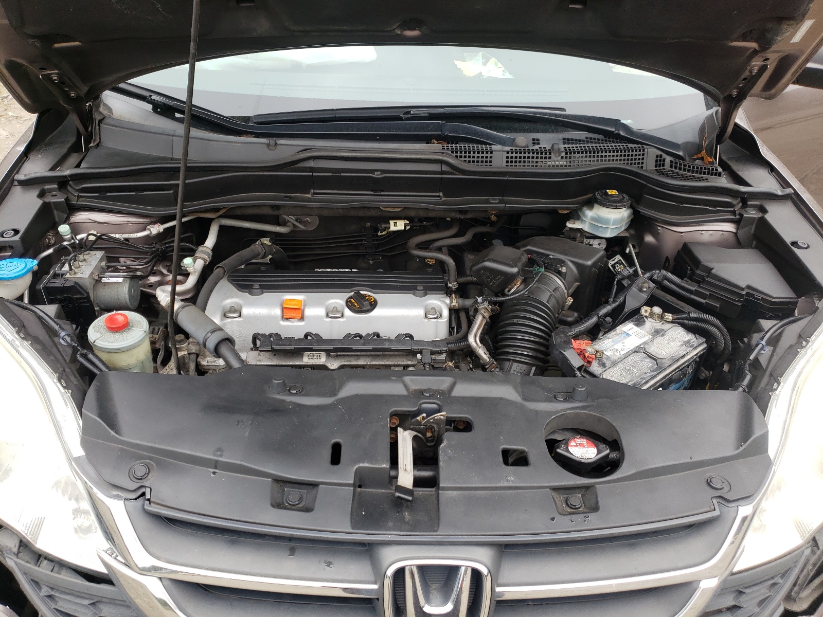 Photo 7 from auction – 2011 HONDA CR-V SE with VIN 5J6RE3H45BL010844