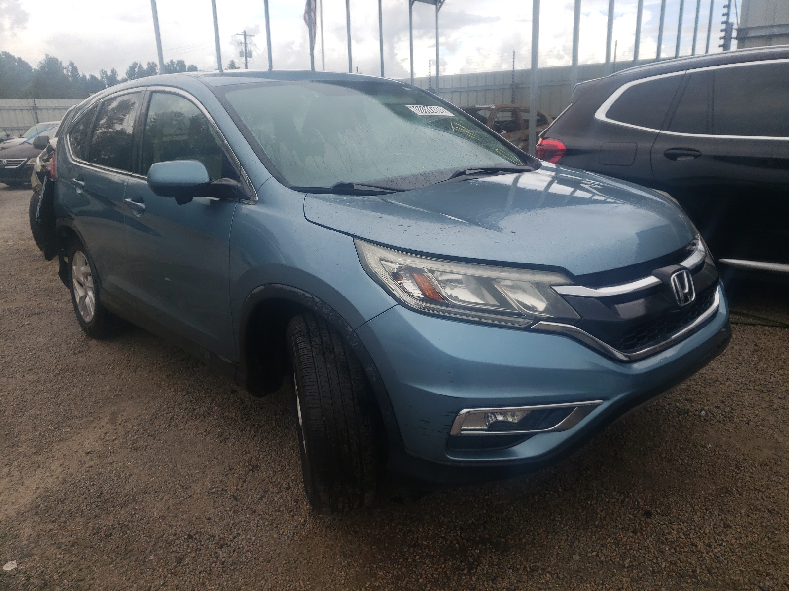 Photo 1 from auction – 2015 HONDA CR-V EX with VIN 2HKRM3H59FH524725