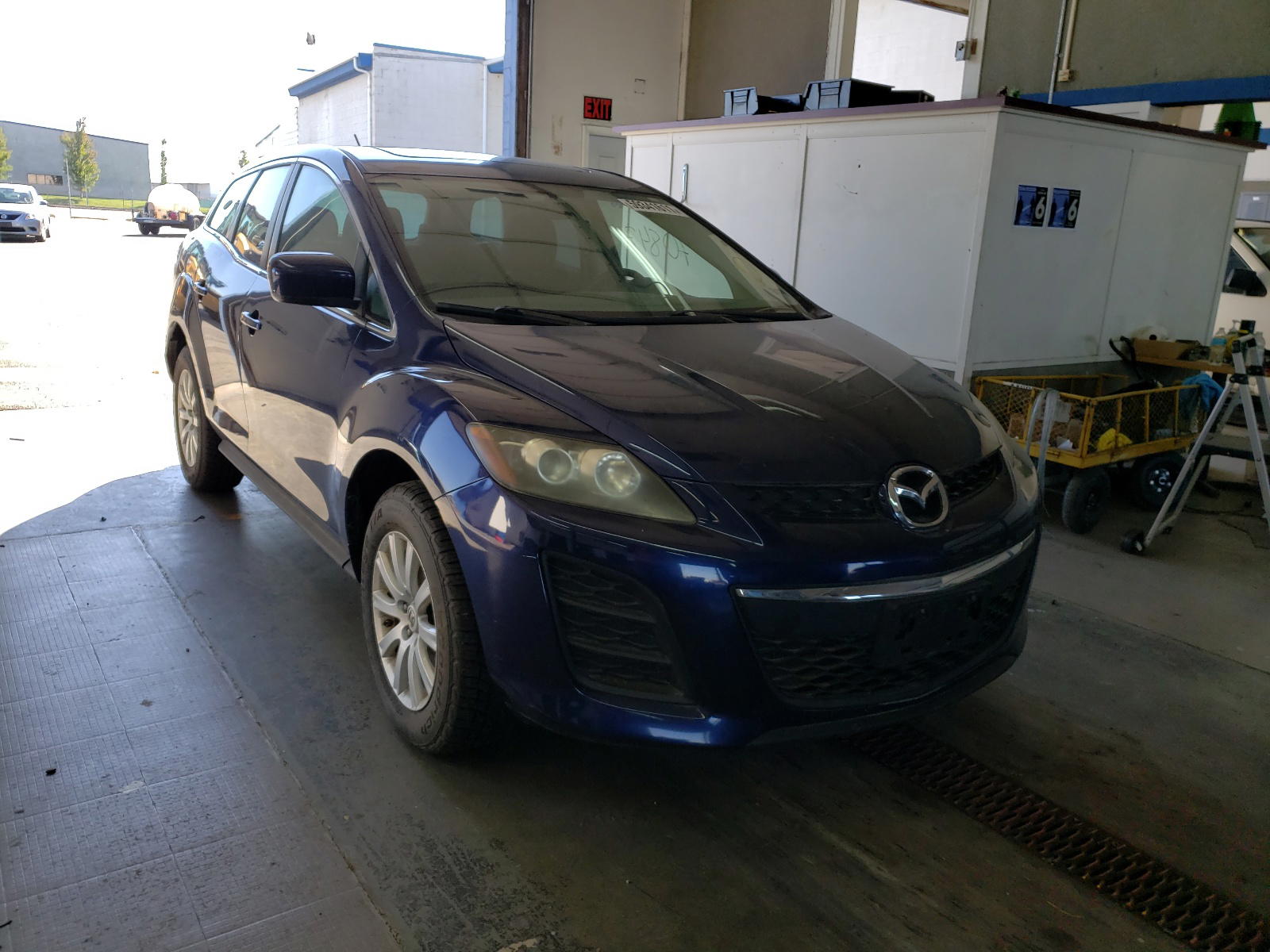 MAZDA CX-7 2011 with VIN JM3ER2B50B0359875 - Photo from auction