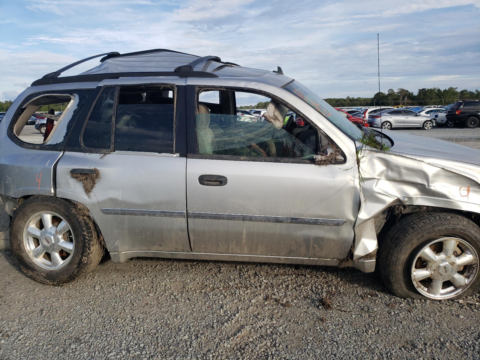 Photo 5 from auction – 2007 GMC ENVOY with VIN 1GKDS13S872100557