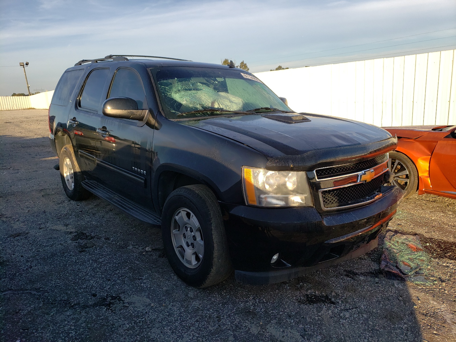 CHEVROLET TAHOE C150 2012 with VIN 1GNSCBE07CR259760 - Photo from auction