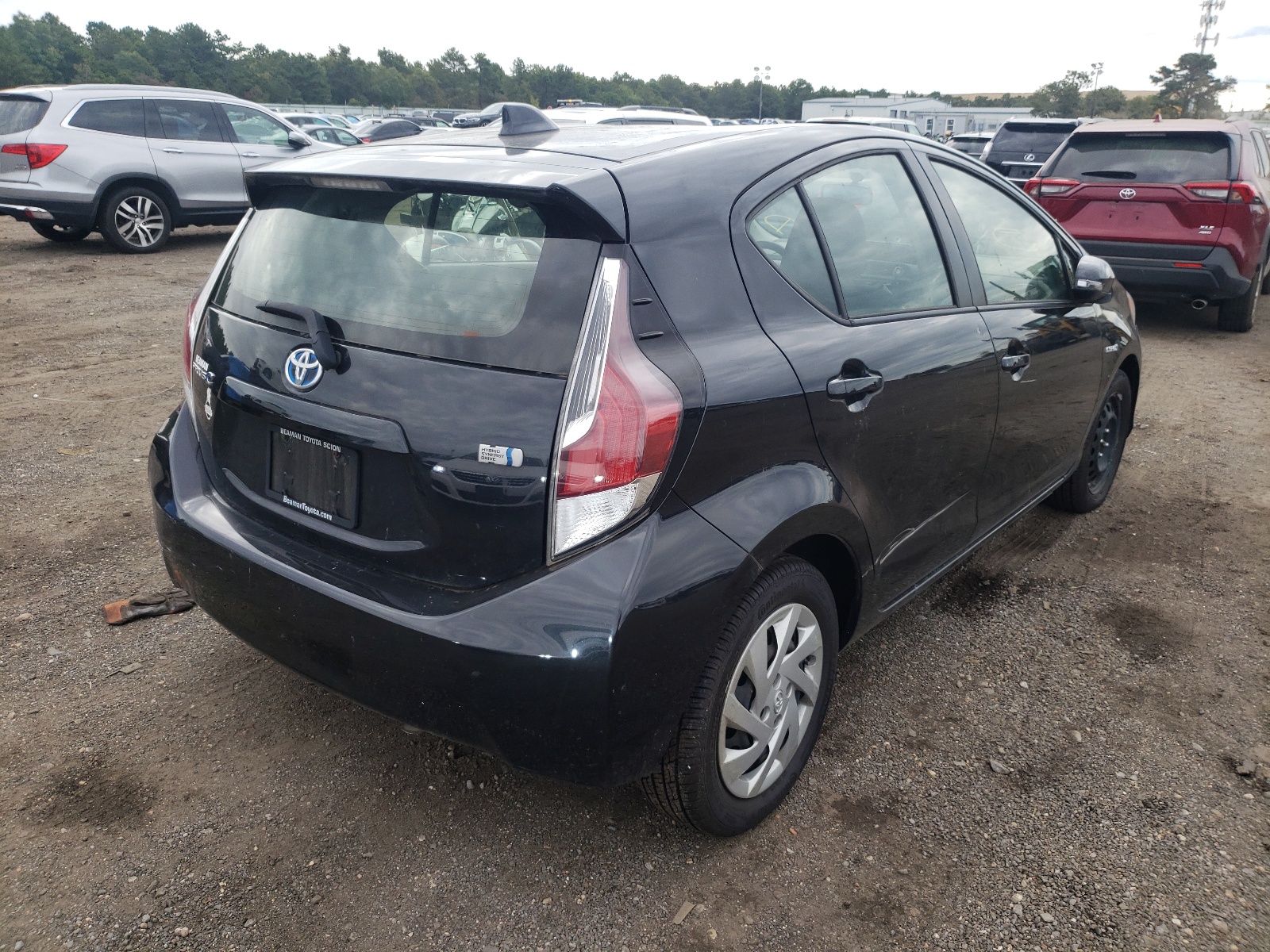 Photo 4 from auction – 2015 TOYOTA PRIUS C with VIN JTDKDTB33F1113711
