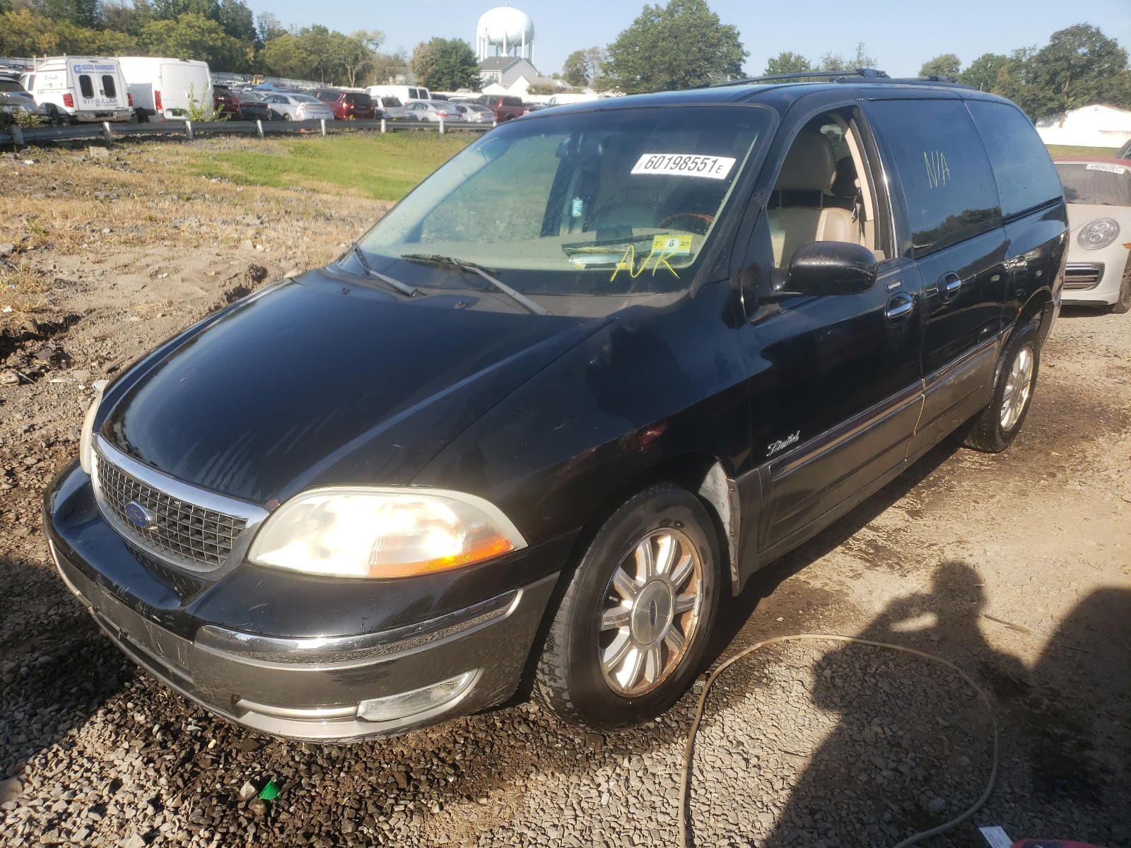 Photo 2 from auction – 2002 FORD WINDSTAR L with VIN 2FMDA58452BB83976