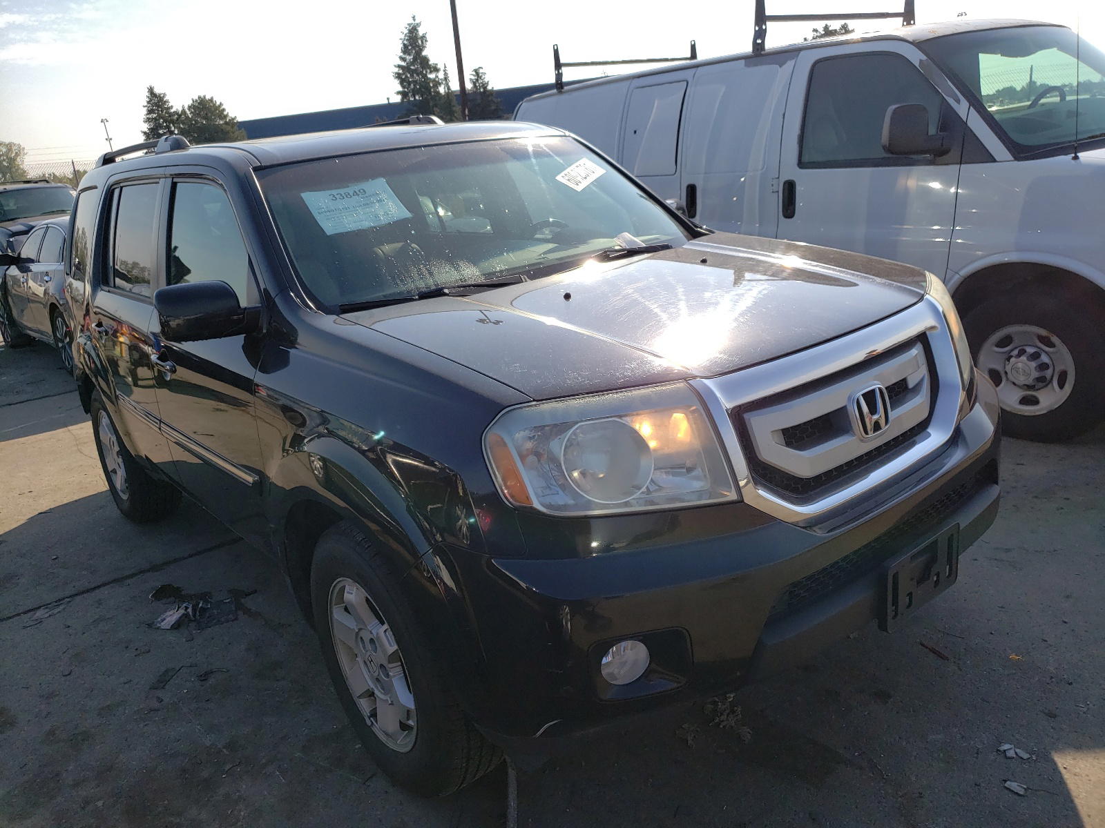 HONDA PILOT TOUR 2011 with VIN 5FNYF4H96BB501314 - Photo from auction