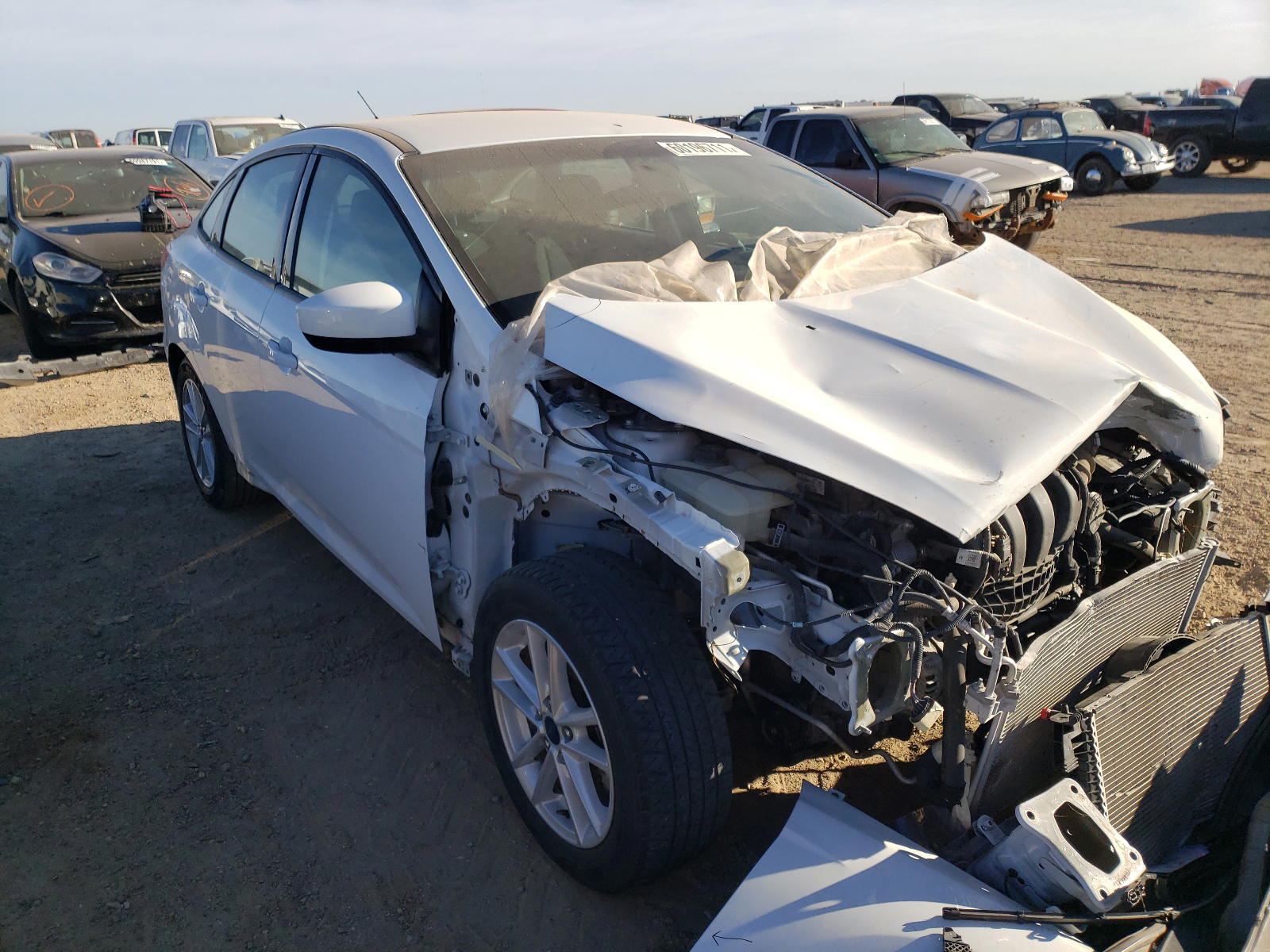 FORD FOCUS SE 2018 with VIN 1FADP3F20JL218369 - Photo from auction