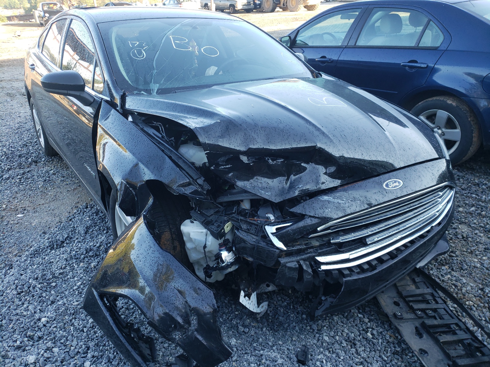 FORD FUSION S 2018 with VIN 3FA6P0LU1JR140294 - Photo from auction