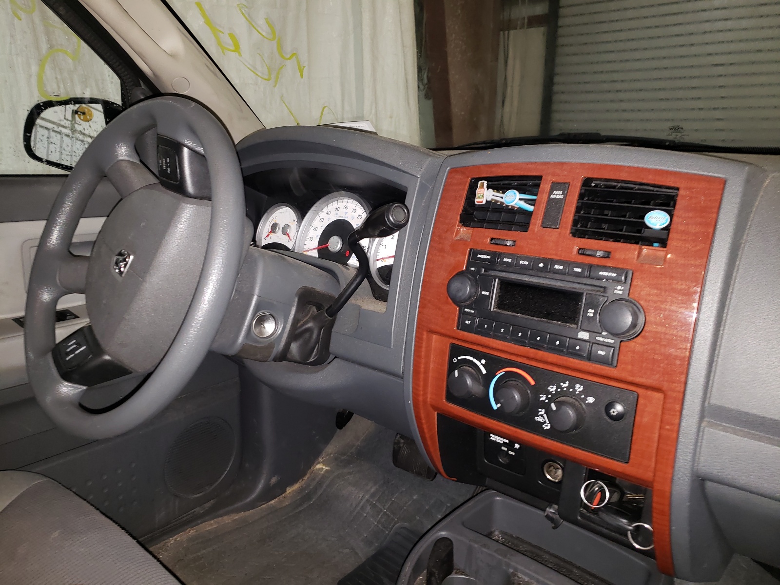 Photo 9 from auction – 2005 DODGE DAKOTA SLT with VIN 1D7HE42K75S293729