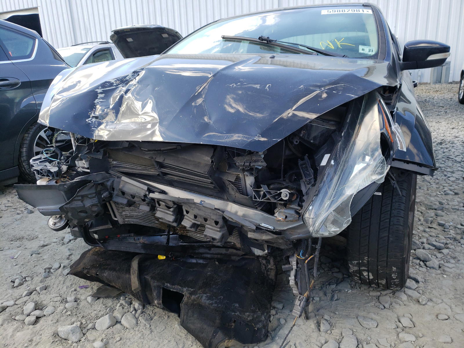 Photo 9 from auction – 2016 FORD FOCUS SE with VIN 1FADP3F25GL248234