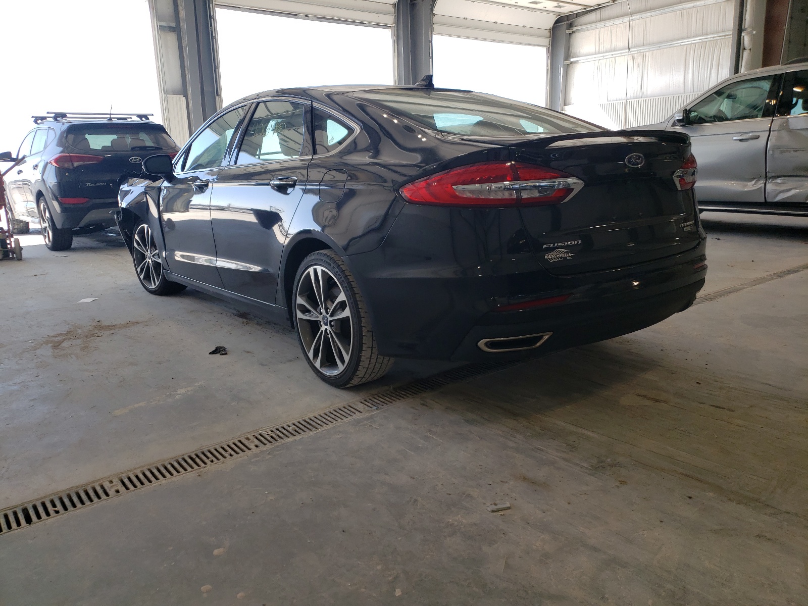 Photo 3 from auction – 2020 FORD FUSION TIT with VIN 3FA6P0D91LR151759