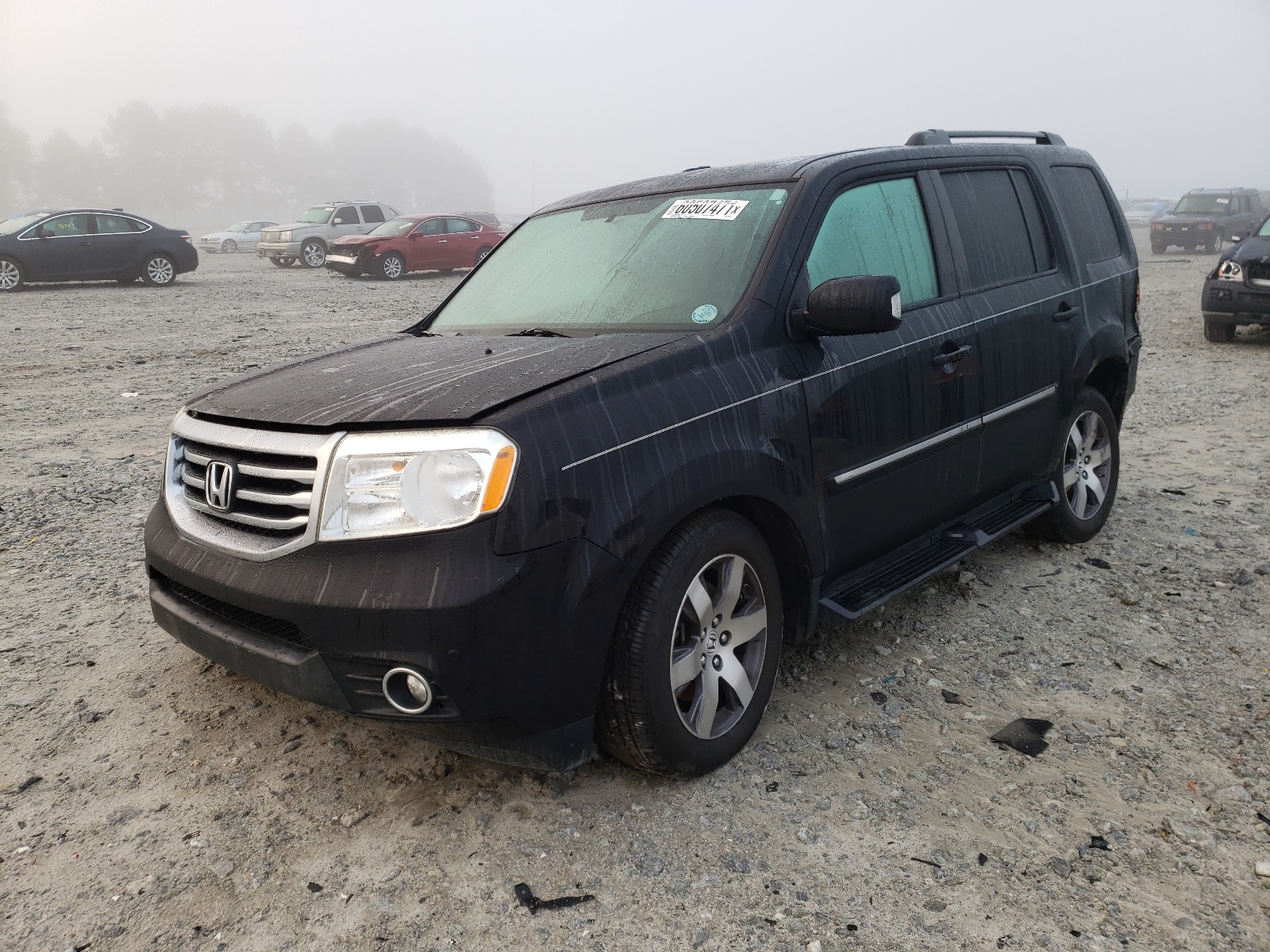 Photo 2 from auction – 2013 HONDA PILOT TOUR with VIN 5FNYF4H92DB052779