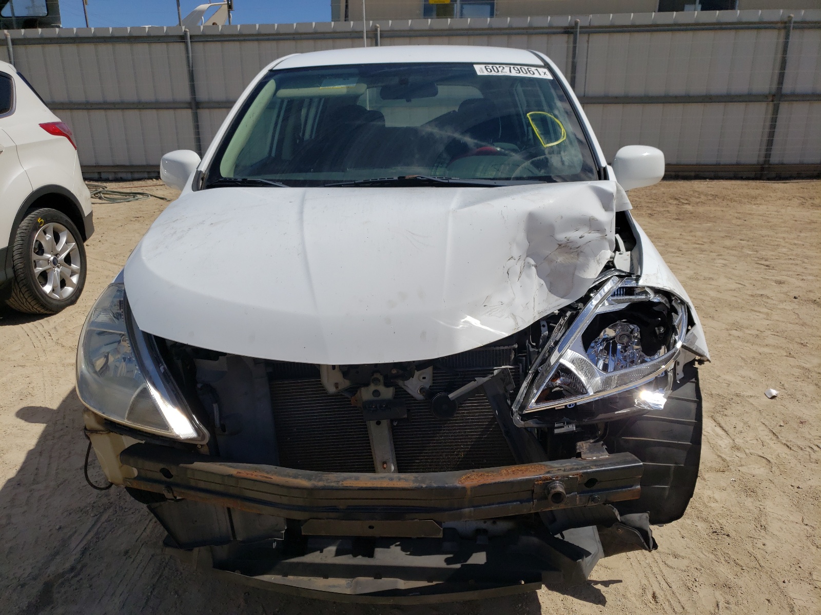 Photo 9 from auction – 2010 NISSAN VERSA S with VIN 3N1BC1CP0AL464721