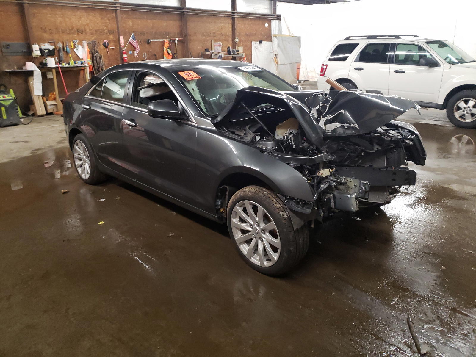 CADILLAC SRX 2018 with VIN 1G6AE5RX4J0107057 - Photo from auction