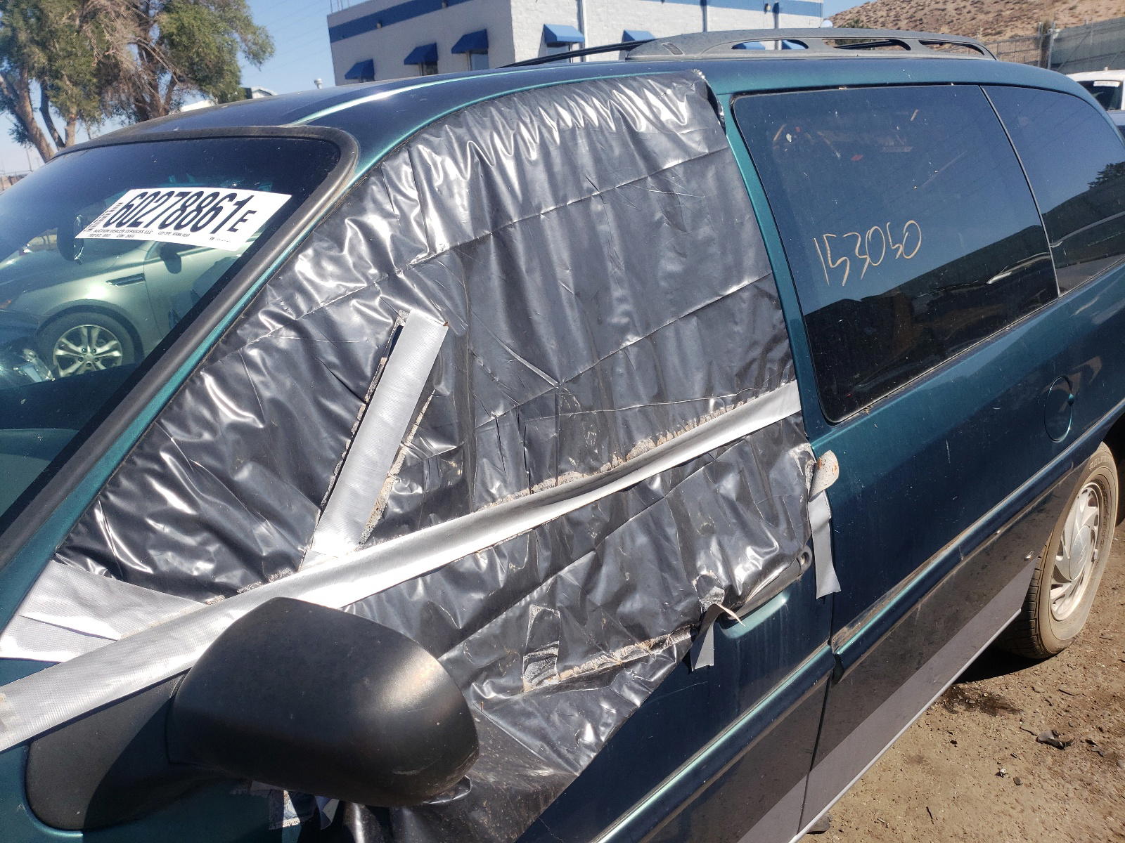 Photo 9 from auction – 1995 FORD WINDSTAR with VIN 2FMDA5140SBB58610
