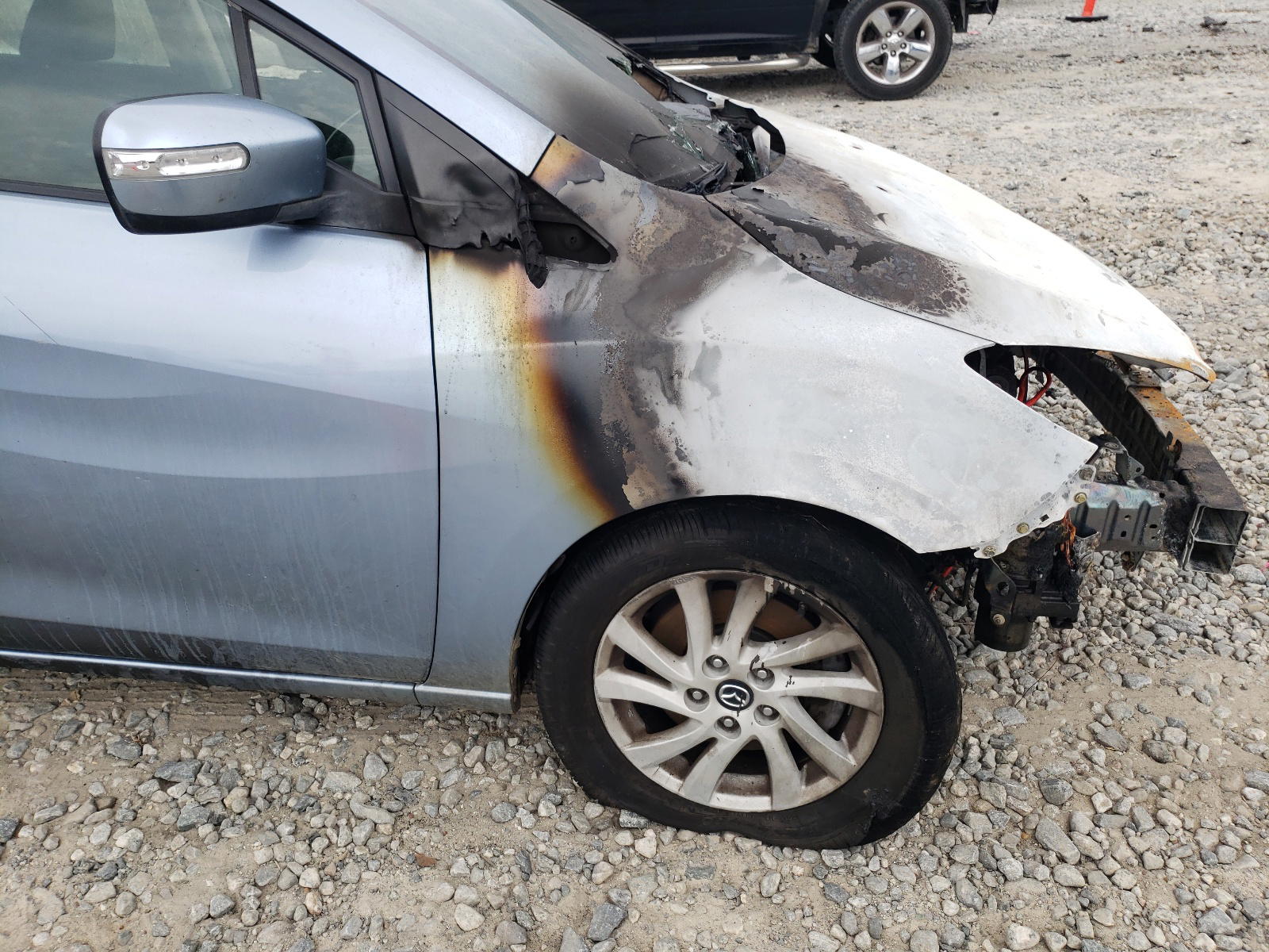 Photo 10 from auction – 2013 MAZDA 5 with VIN JM1CW2BL3D0158059