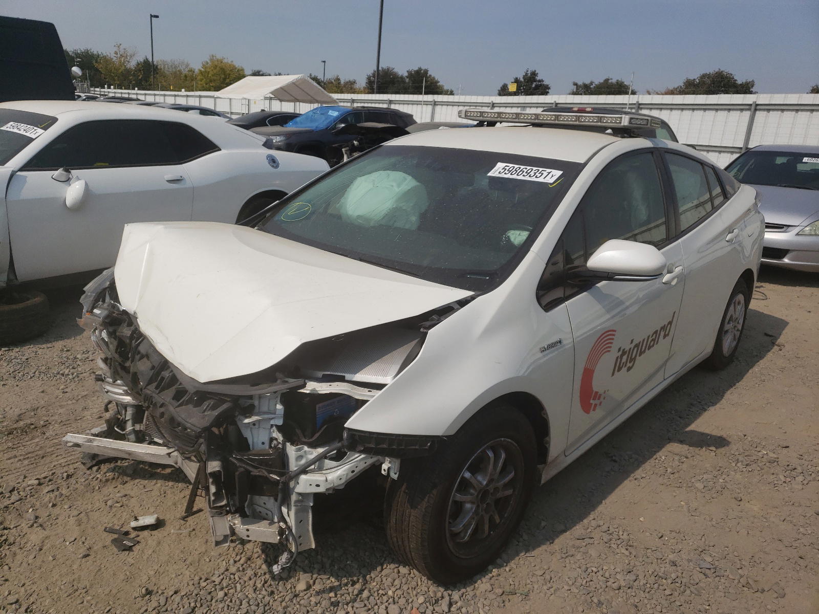 Photo 2 from auction – 2016 TOYOTA PRIUS with VIN JTDKARFU8G3522906