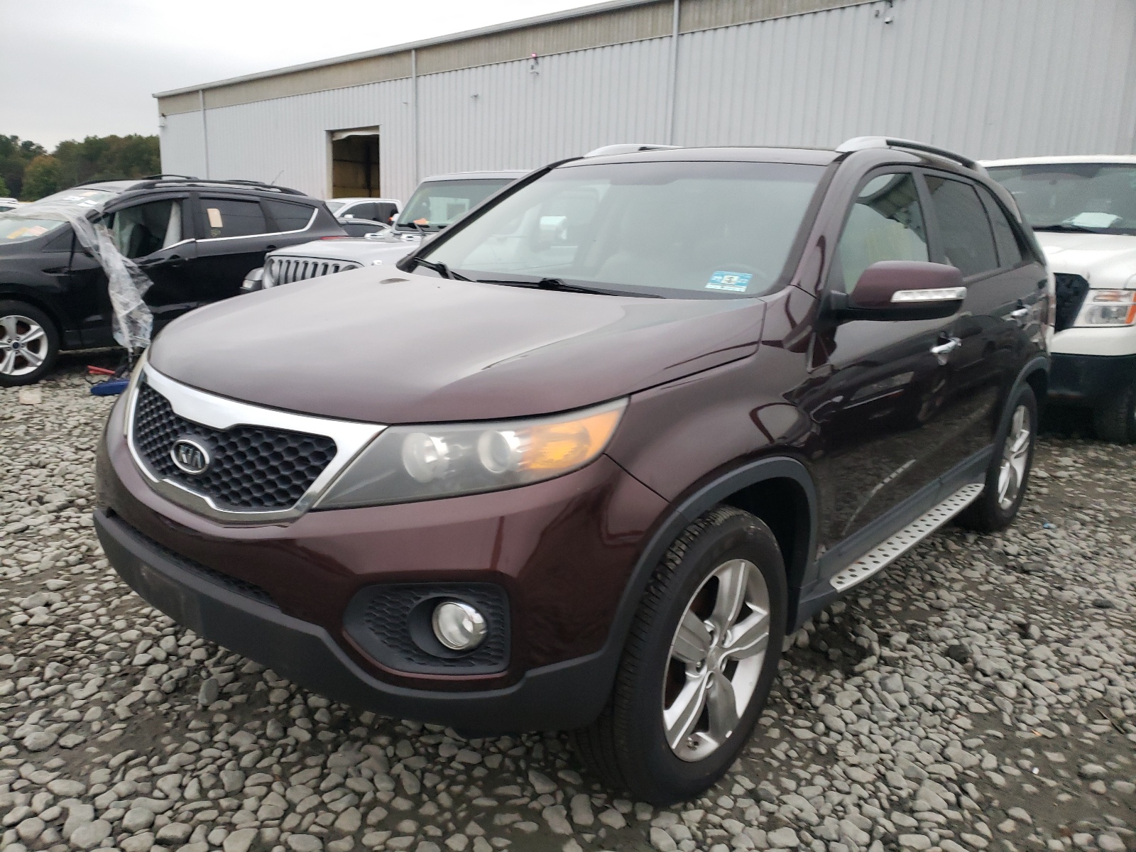 Photo 2 from auction – 2012 KIA SORENTO EX with VIN 5XYKU4A62CG219631