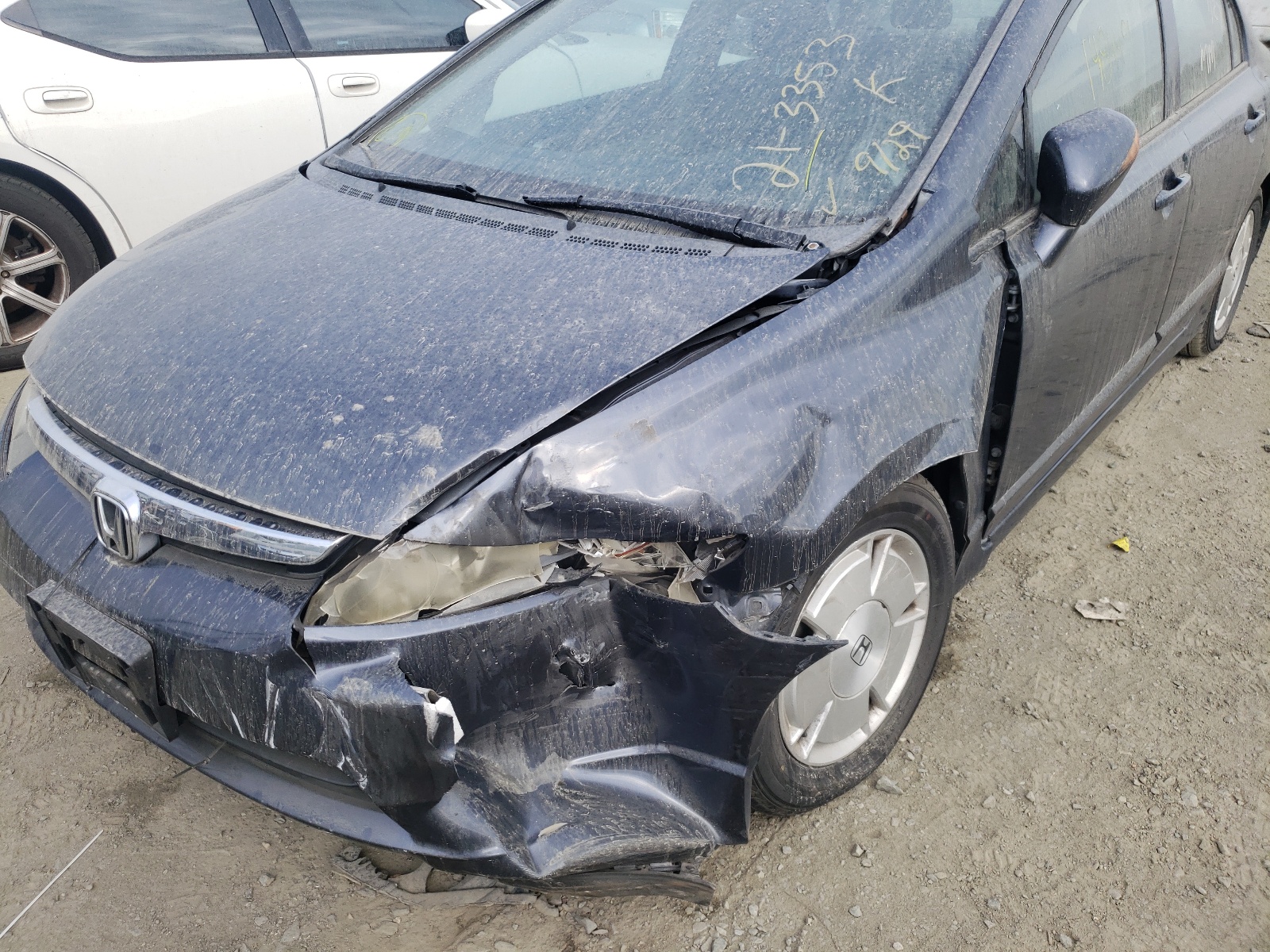 Photo 9 from auction – 2006 HONDA CIVIC HYBR with VIN JHMFA36286S020686