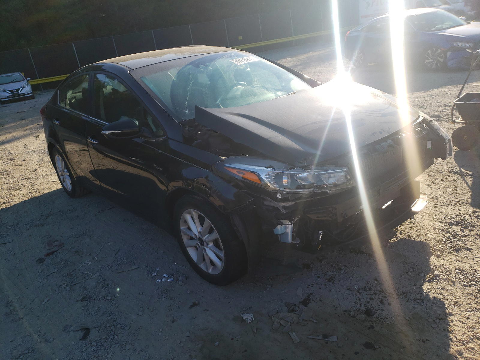 KIA FORTE LX 2017 with VIN 3KPFL4A71HE121563 - Photo from auction