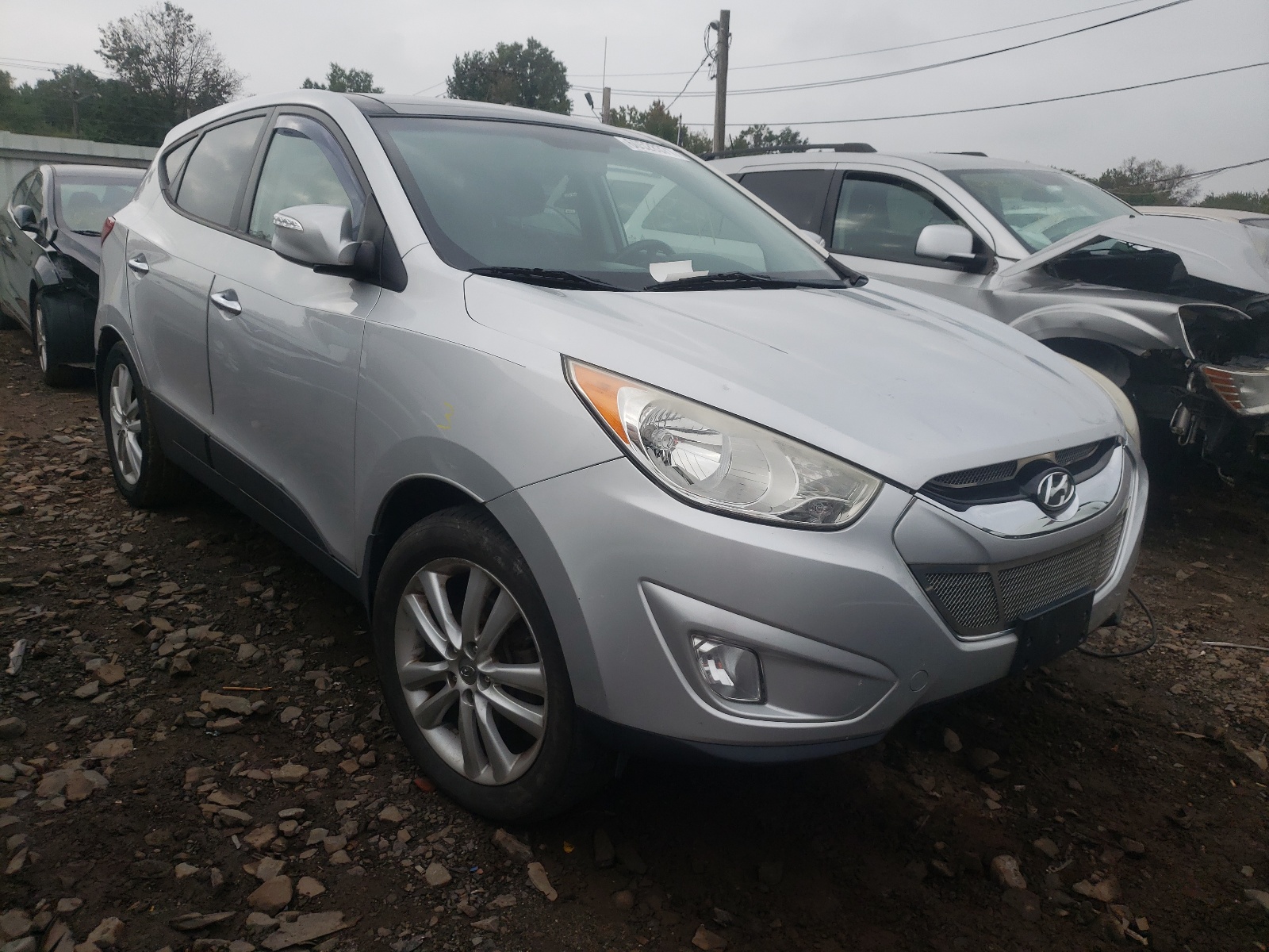 HYUNDAI TUCSON GLS 2010 with VIN KM8JUCAC2AU047197 - Photo from auction