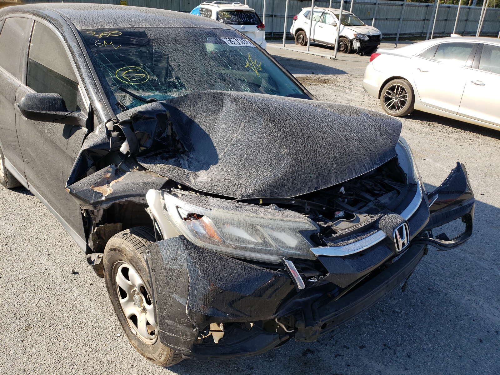 Photo 9 from auction – 2016 HONDA CR-V LX with VIN 2HKRM3H3XGH504239