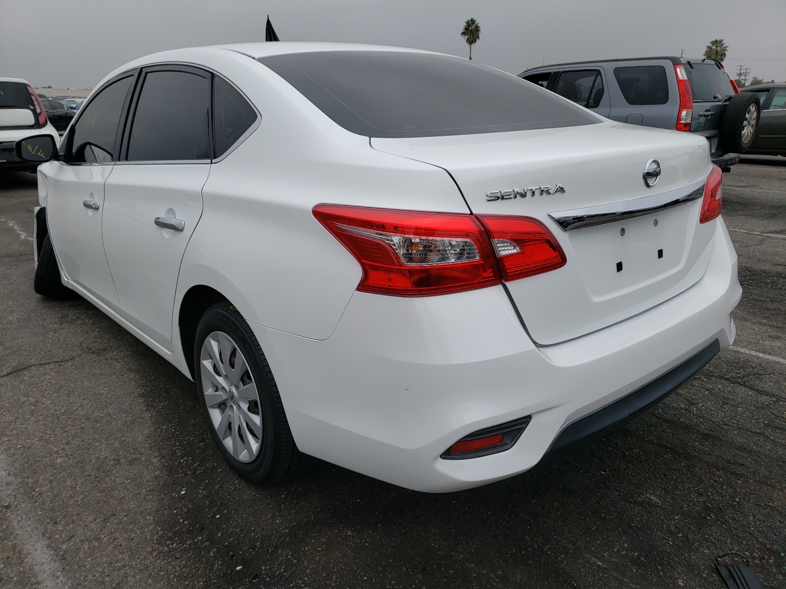 Photo 3 from auction – 2016 NISSAN SENTRA S with VIN 3N1AB7AP7GY248557