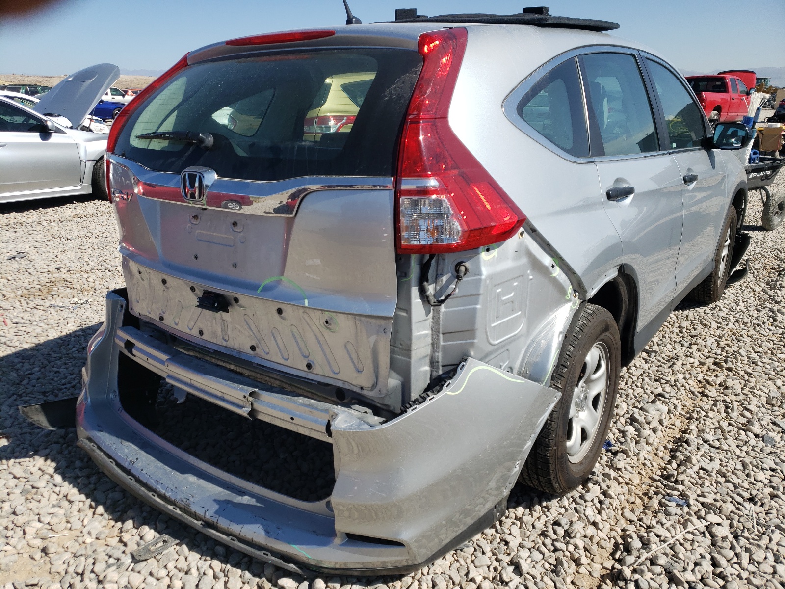Photo 4 from auction – 2015 HONDA CR-V LX with VIN 3CZRM3H33FG703988