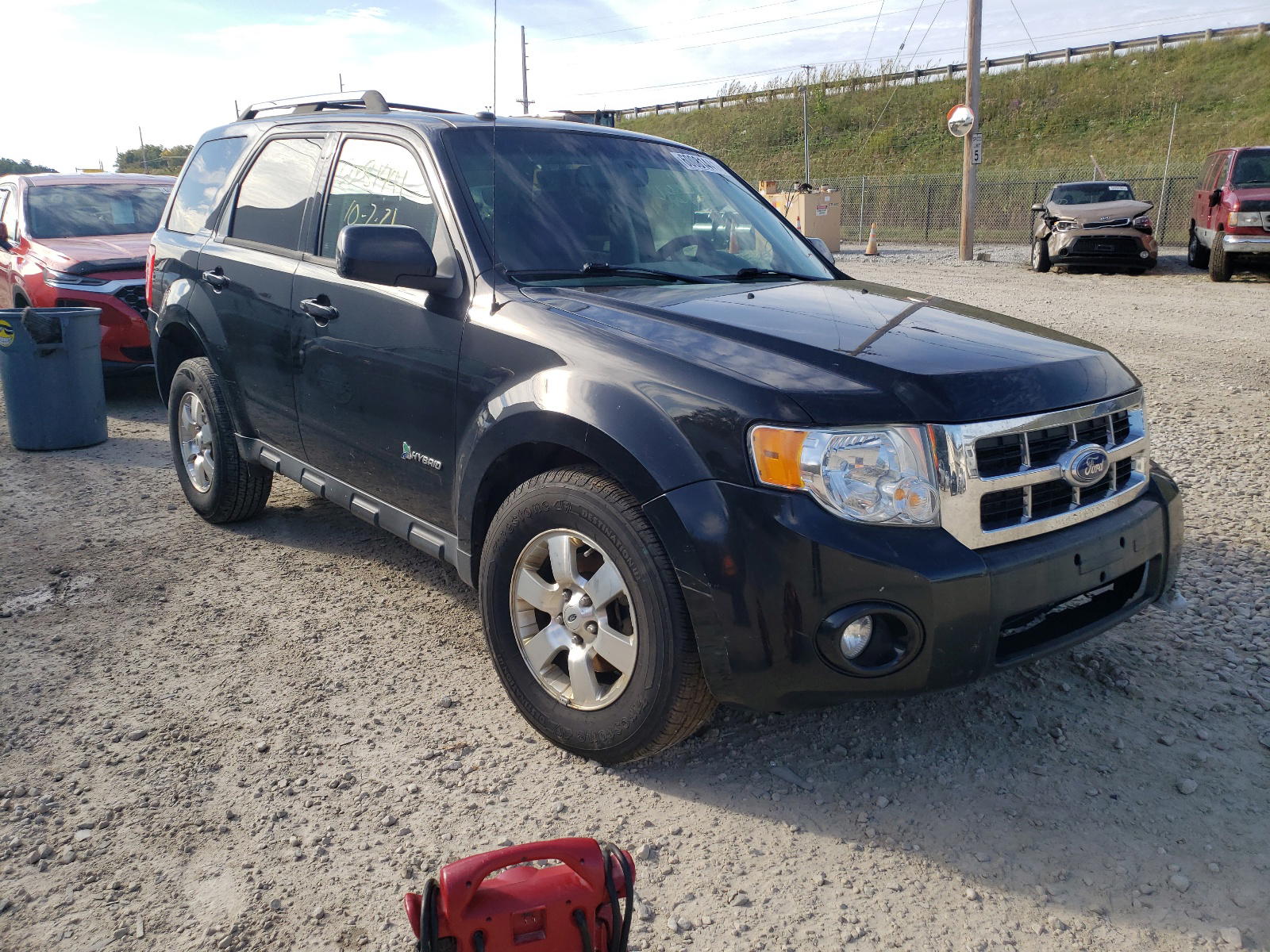 FORD ESCAPE HYB 2011 with VIN 1FMCU4K31BKC02512 - Photo from auction