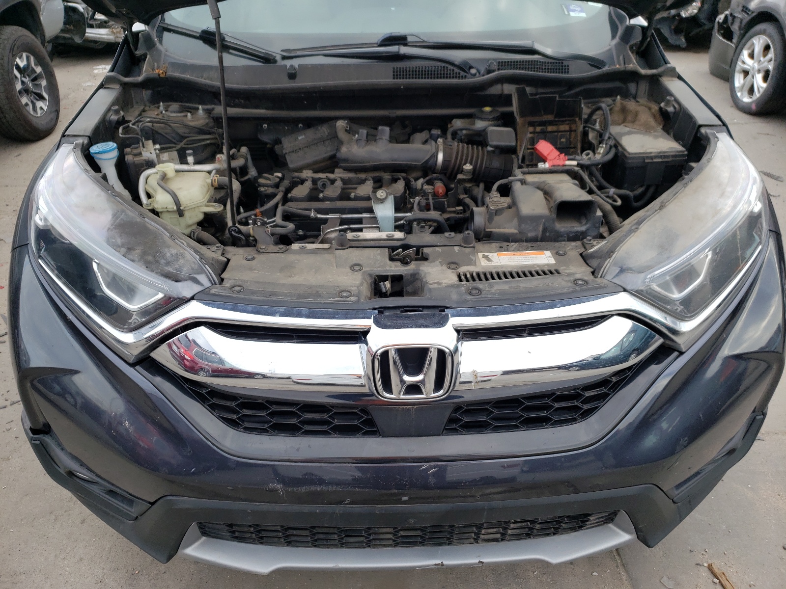 Photo 7 from auction – 2017 HONDA CR-V EX with VIN 2HKRW2H57HH664408
