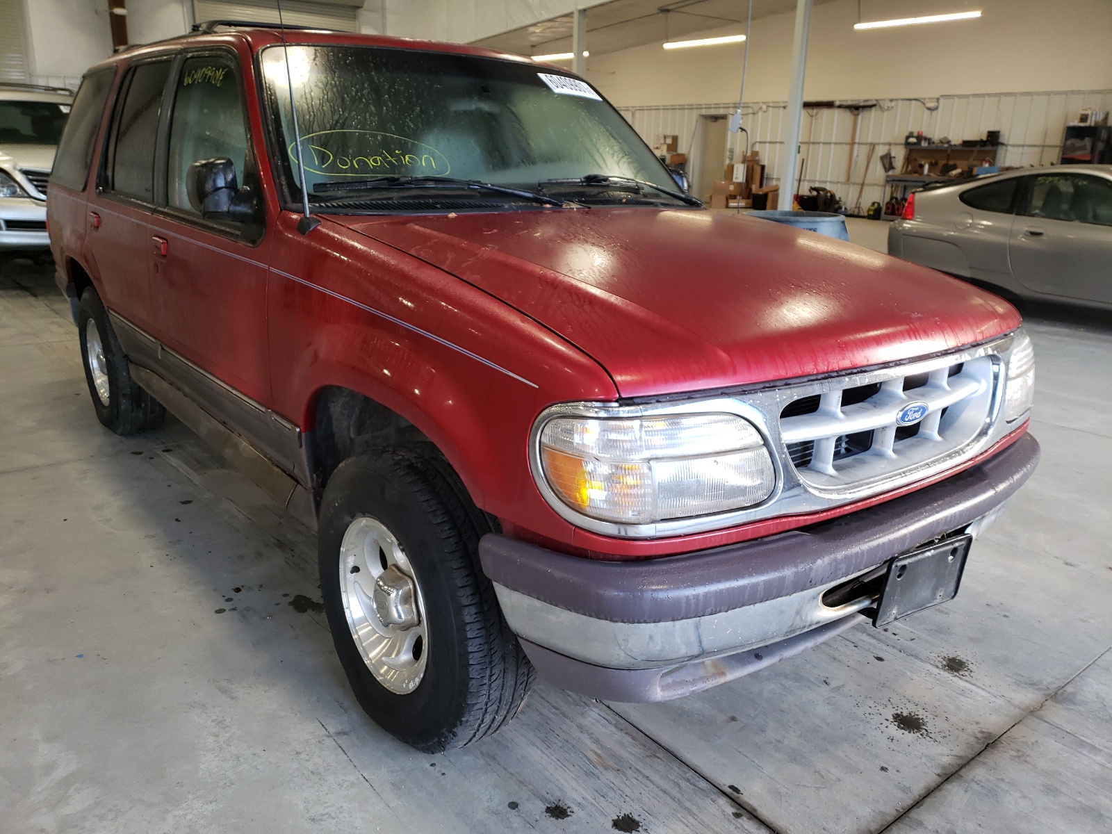 FORD EXPLORER 1998 with VIN 1FMDU34E1VUC86420 - Photo from auction