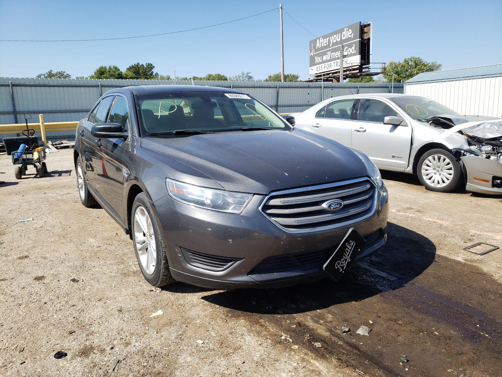 FORD TAURUS SE 2015 with VIN 1FAHP2D88FG141138 - Photo from auction