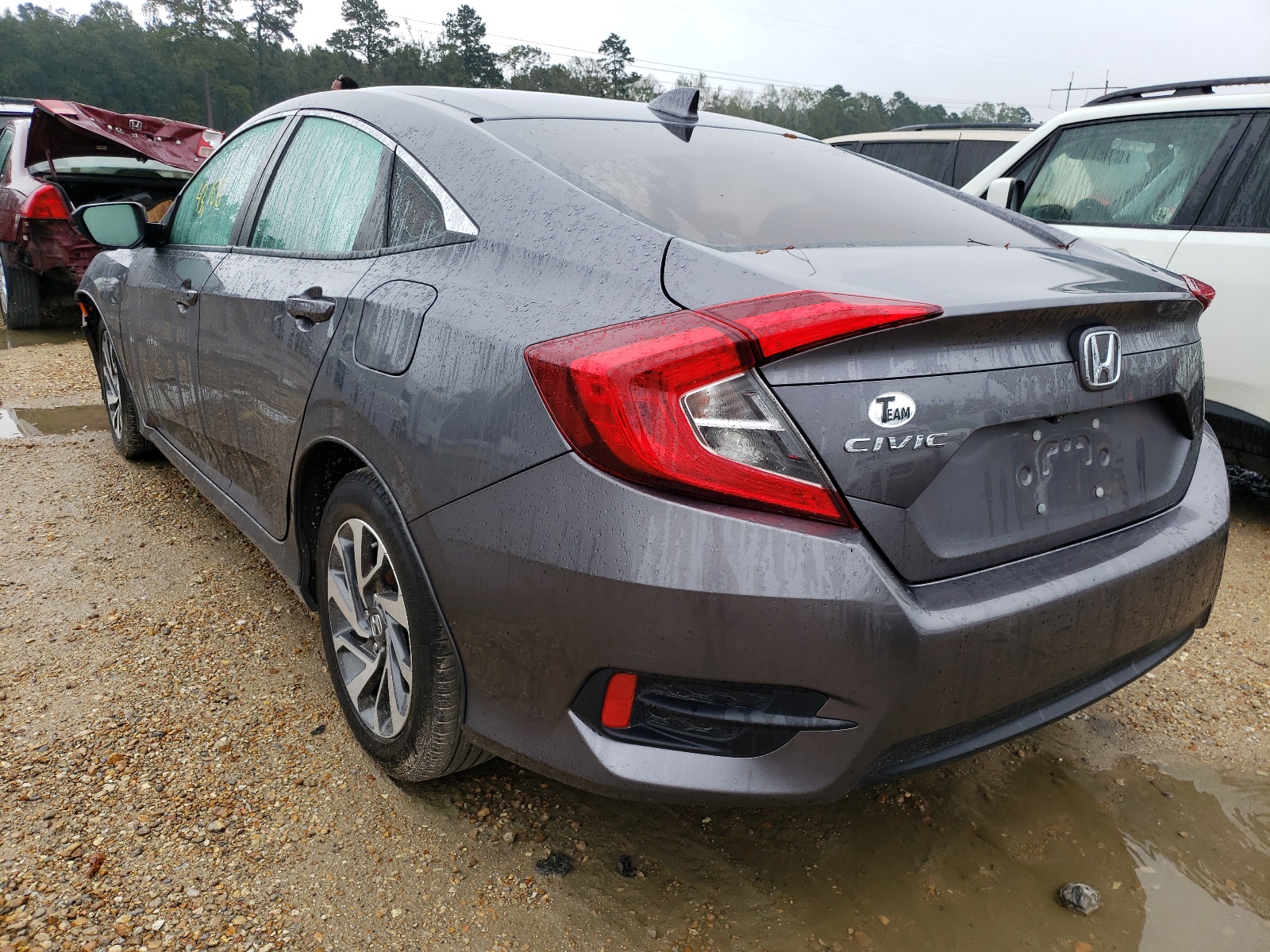 Photo 3 from auction – 2018 HONDA CIVIC EX with VIN 19XFC2F77JE032082