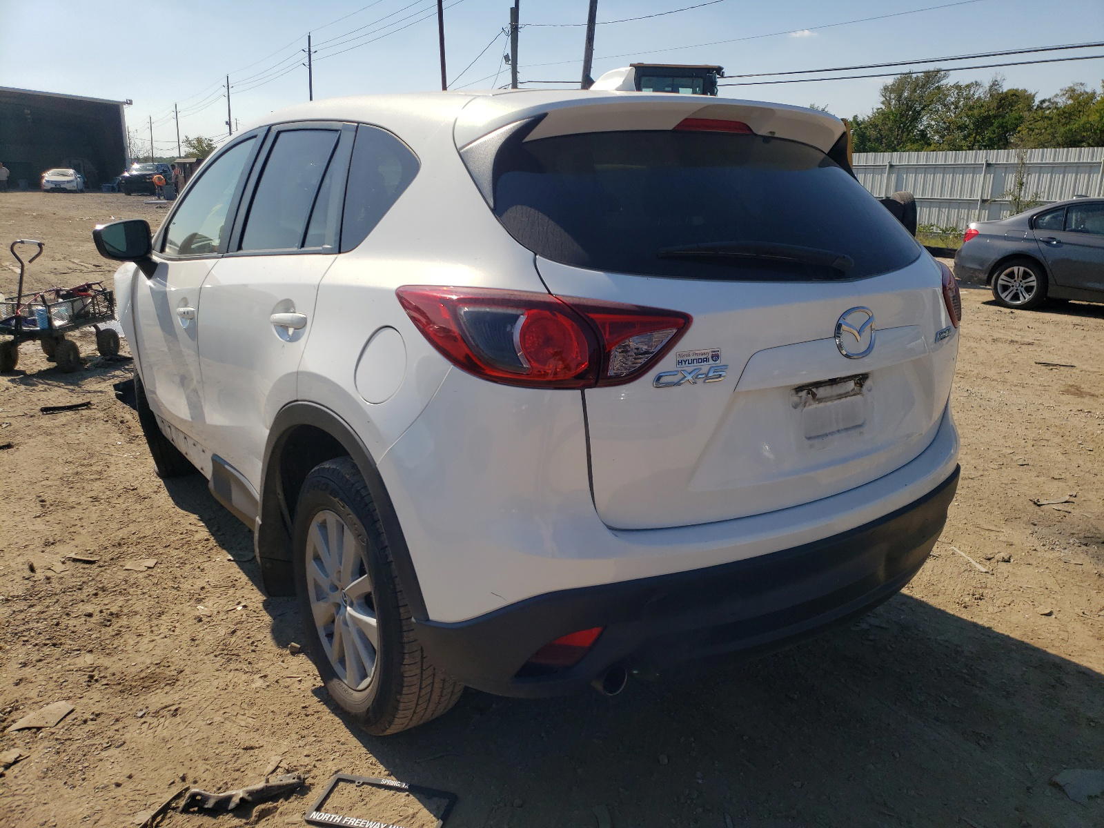 Photo 3 from auction – 2015 MAZDA CX-5 TOURI with VIN JM3KE2CY0F0469211