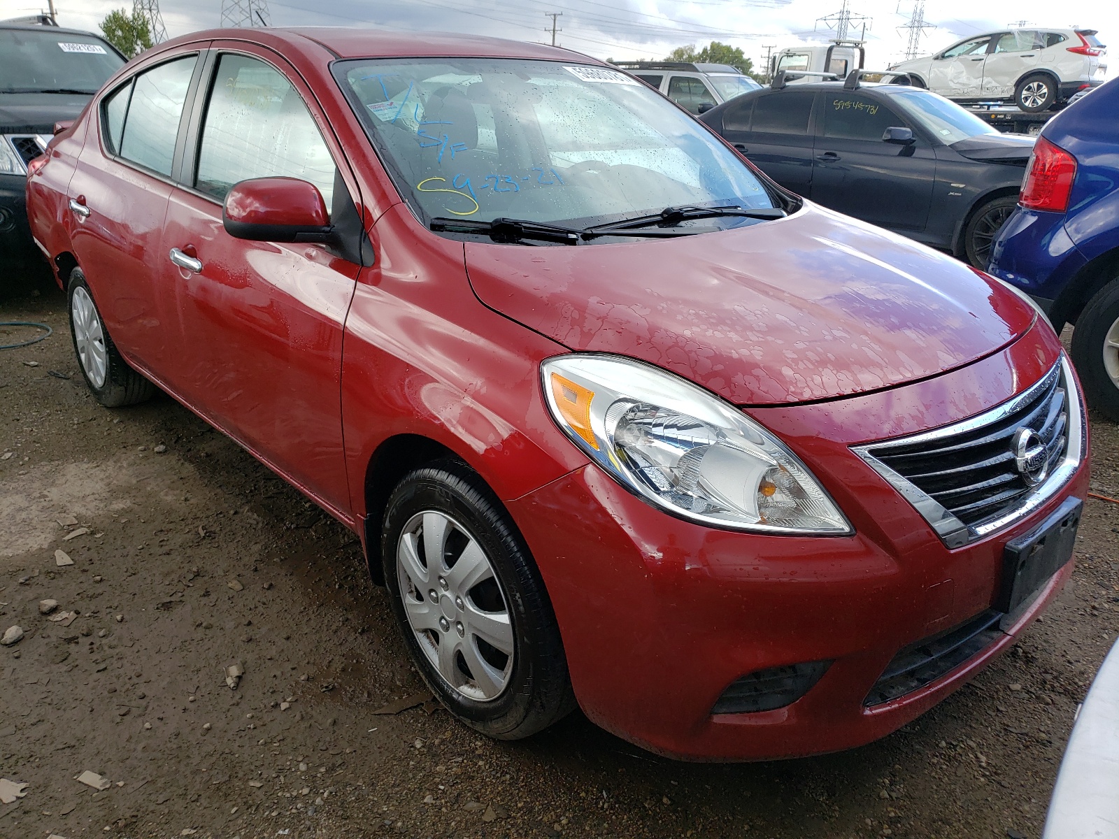NISSAN VERSA S 2013 with VIN 3N1CN7AP2DL884117 - Photo from auction