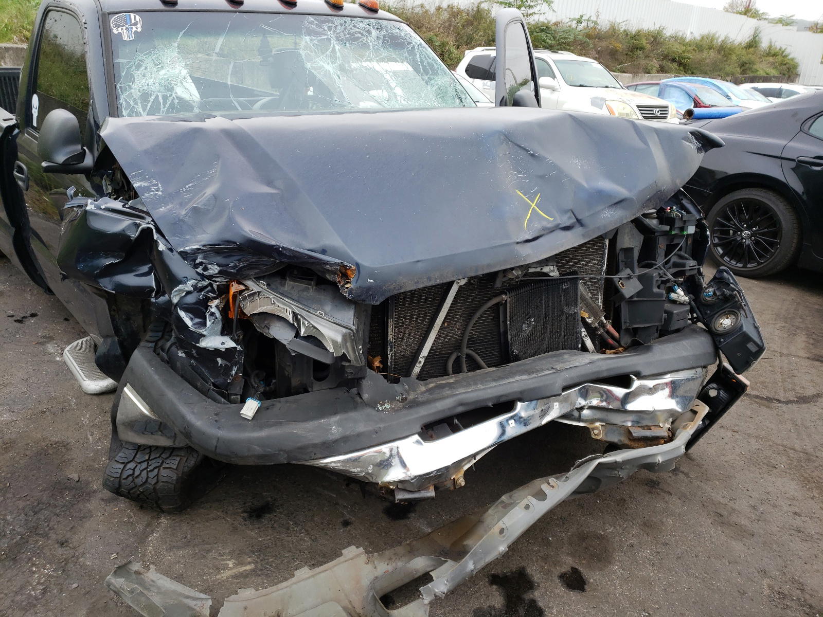 Photo 9 from auction – 2005 CHEVROLET SILVERADO with VIN 1GCEK14VX5Z260002