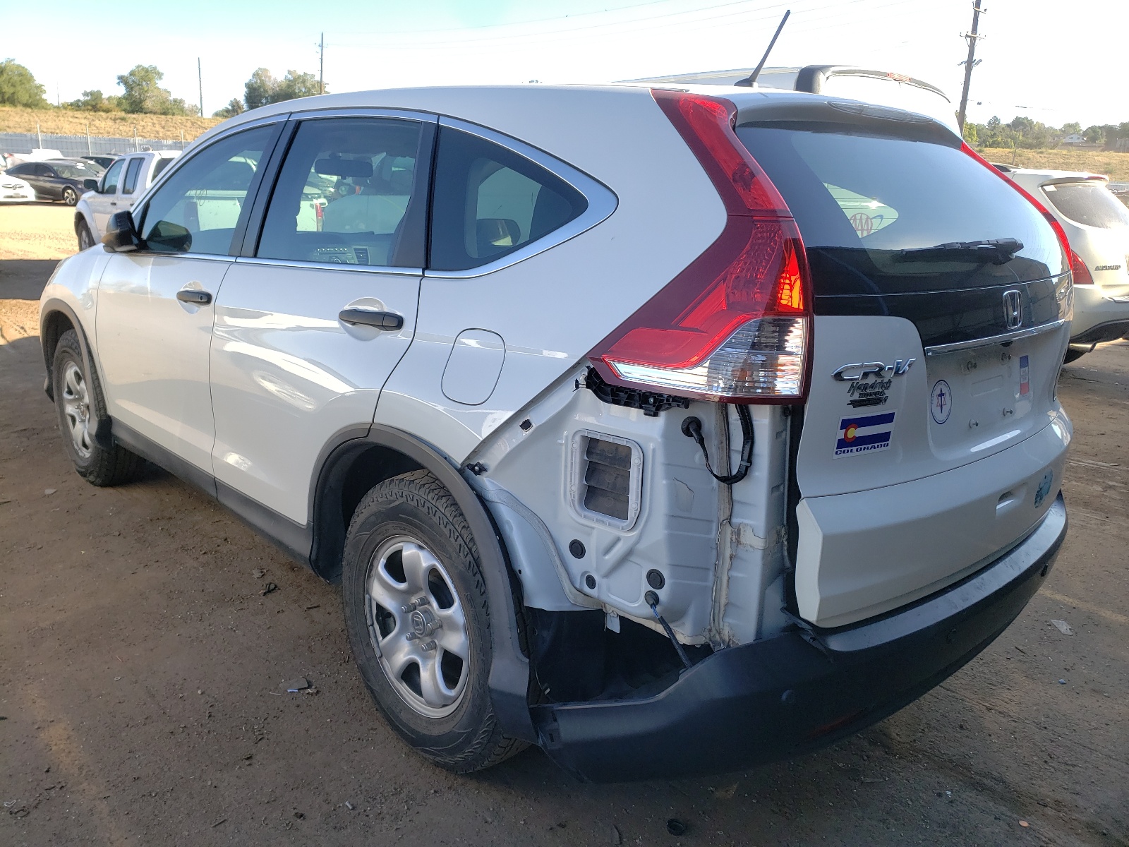Photo 3 from auction – 2014 HONDA CR-V LX with VIN 5J6RM3H34EL044028