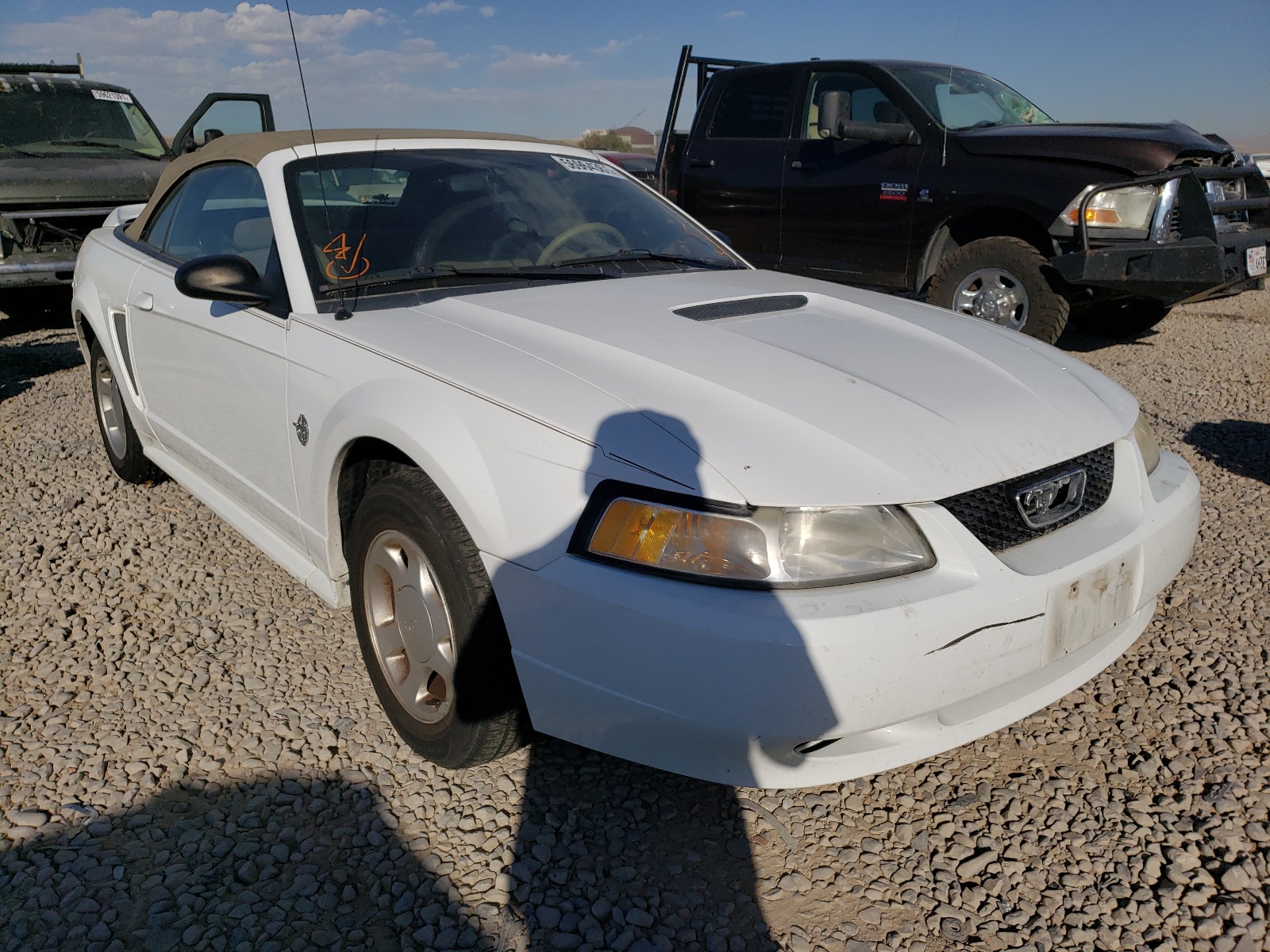 FORD MUSTANG 1999 with VIN 1FAFP4442XF140767 - Photo from auction