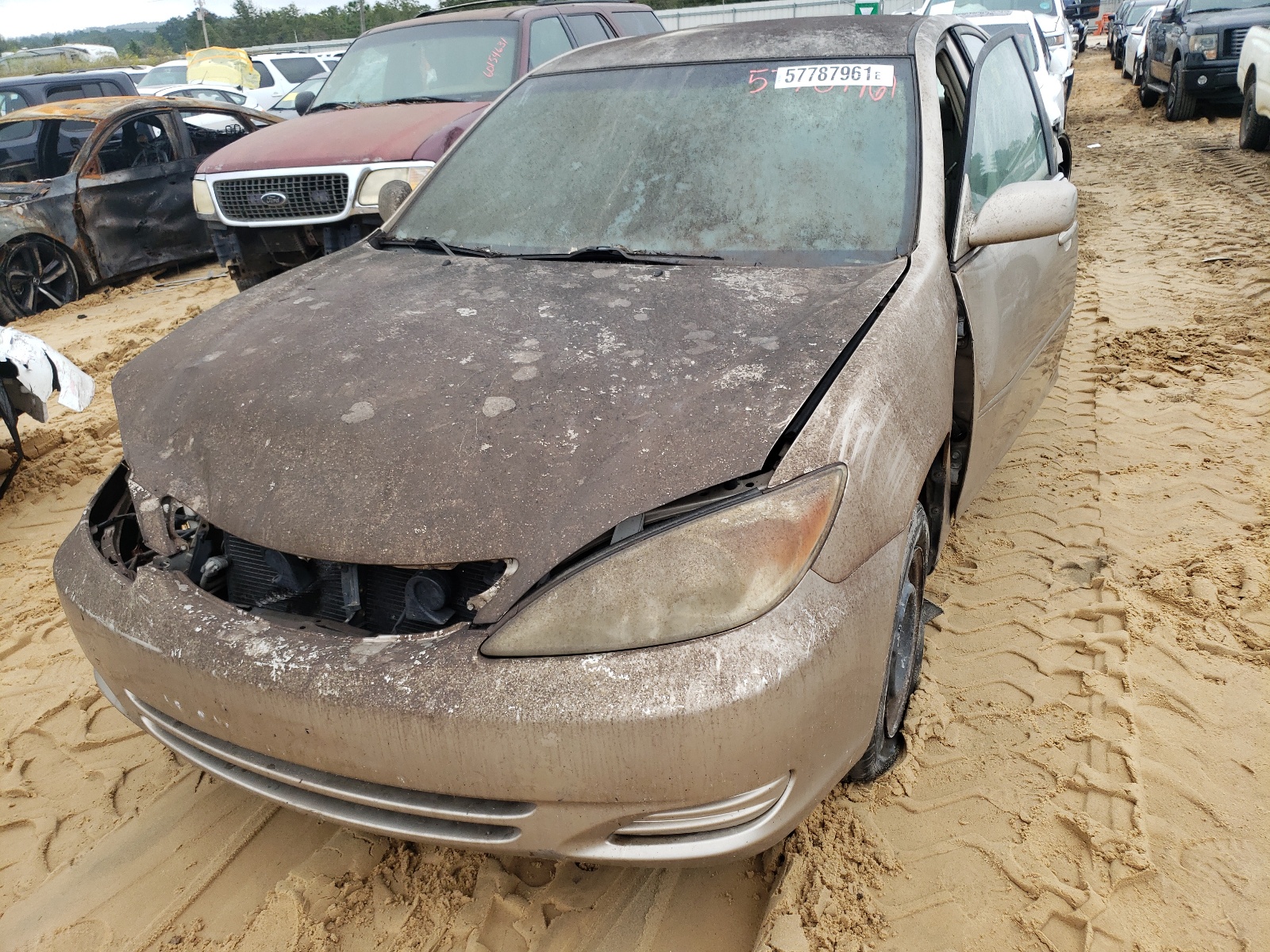 Photo 9 from auction – 2003 TOYOTA CAMRY LE with VIN 4T1BE32K03U144909