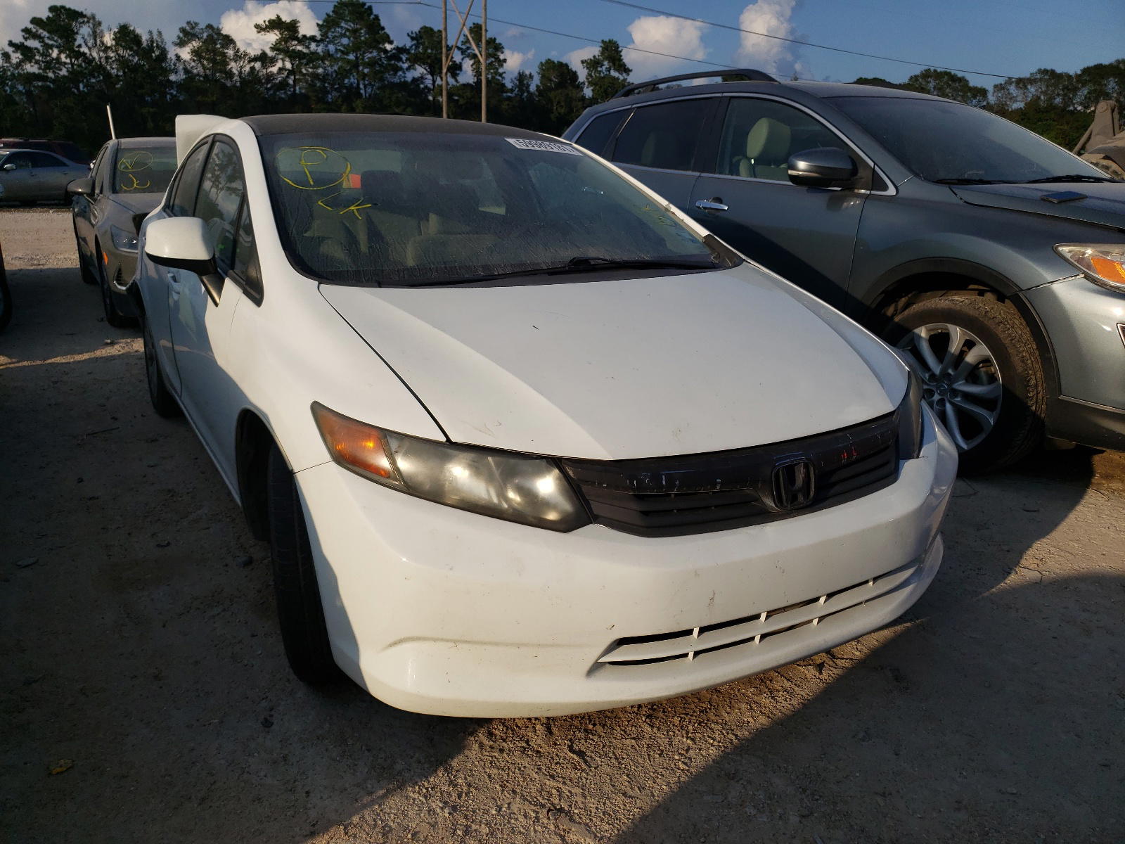 HONDA CIVIC LX 2012 with VIN 19XFB2F5XCE067199 - Photo from auction