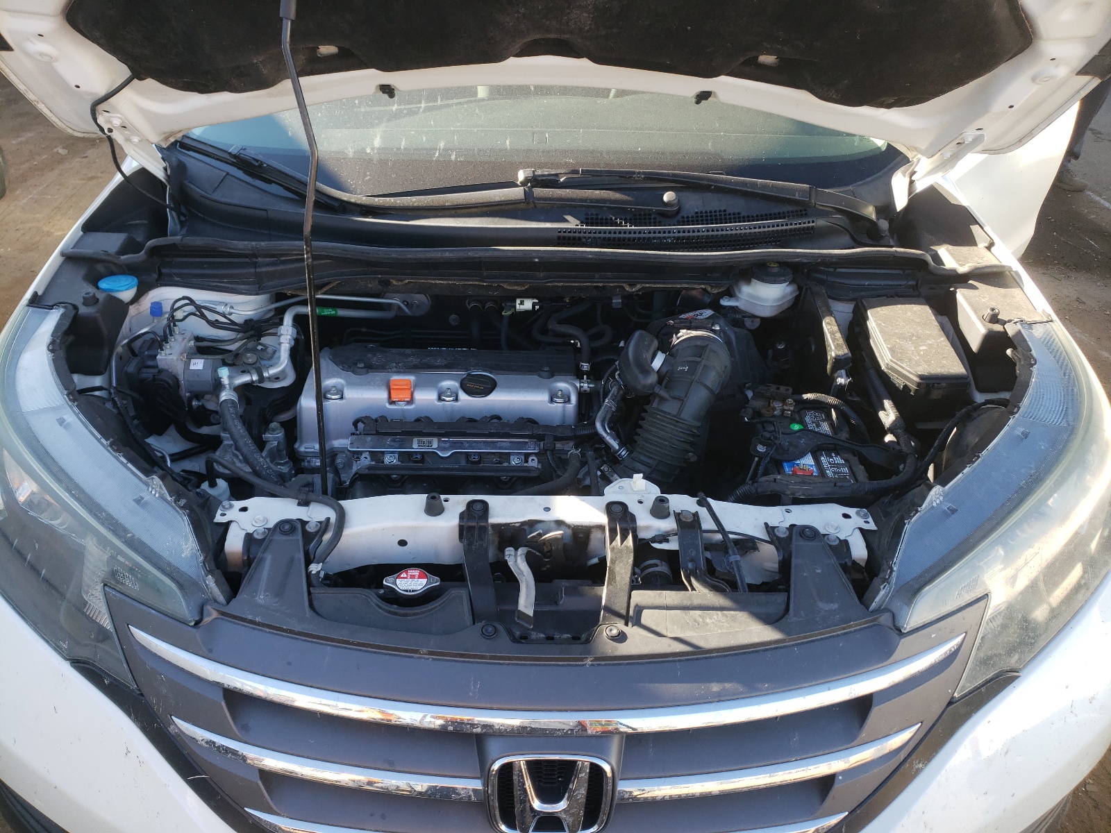 Photo 7 from auction – 2014 HONDA CR-V LX with VIN 5J6RM3H34EL044028