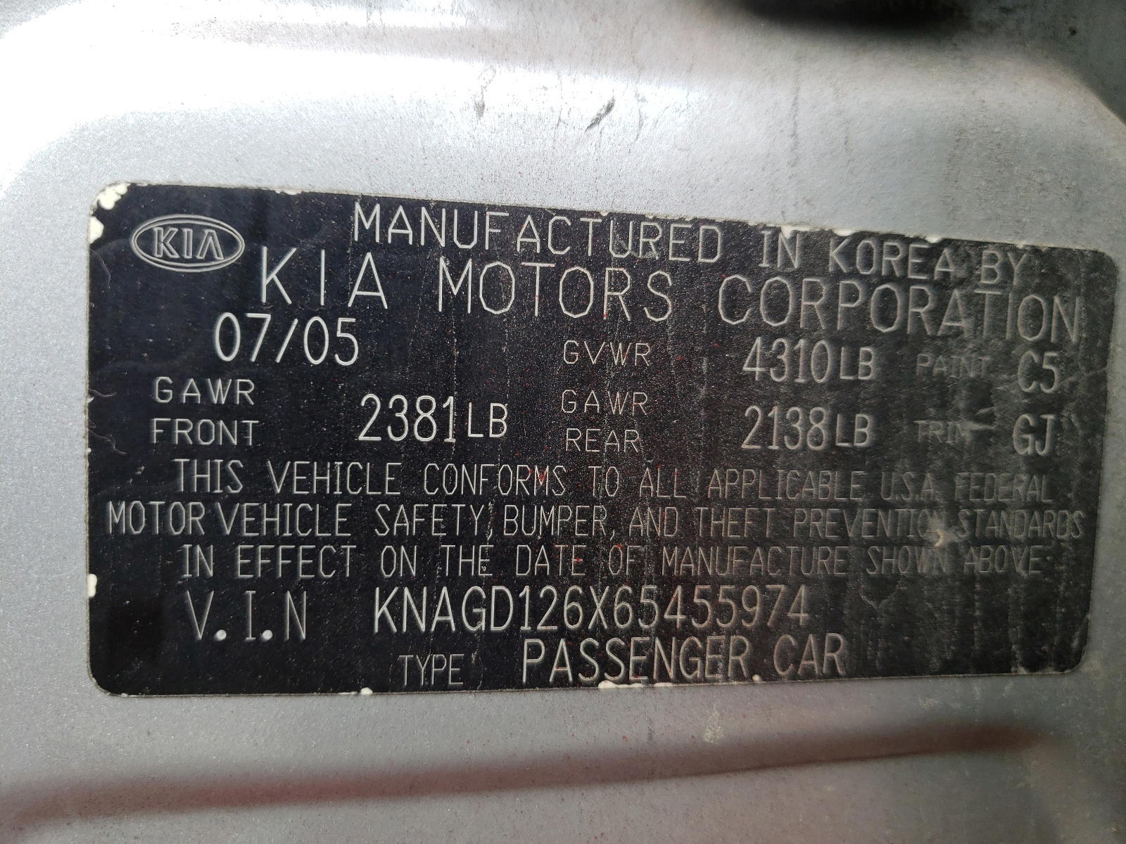 Photo 10 from auction – 2006 KIA OPTIMA LX with VIN KNAGD126X65455974