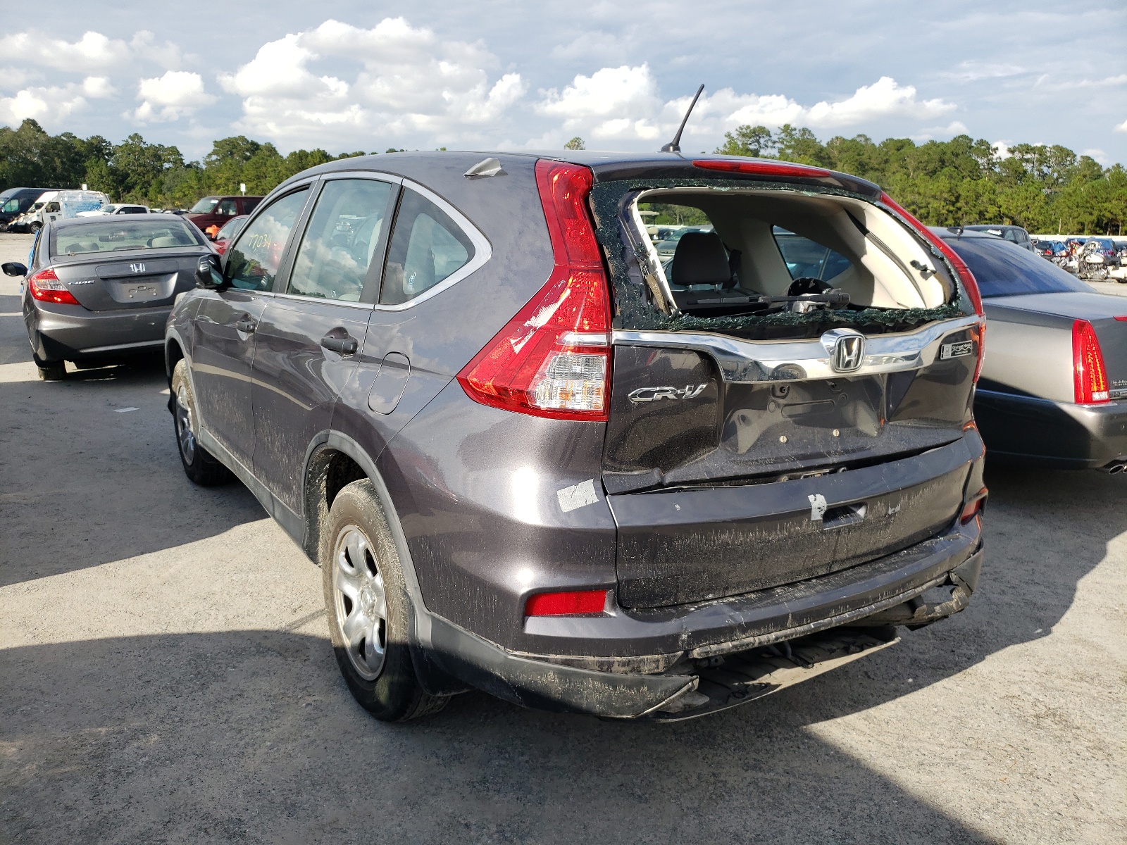 Photo 3 from auction – 2015 HONDA CR-V LX with VIN 3CZRM3H30FG704340