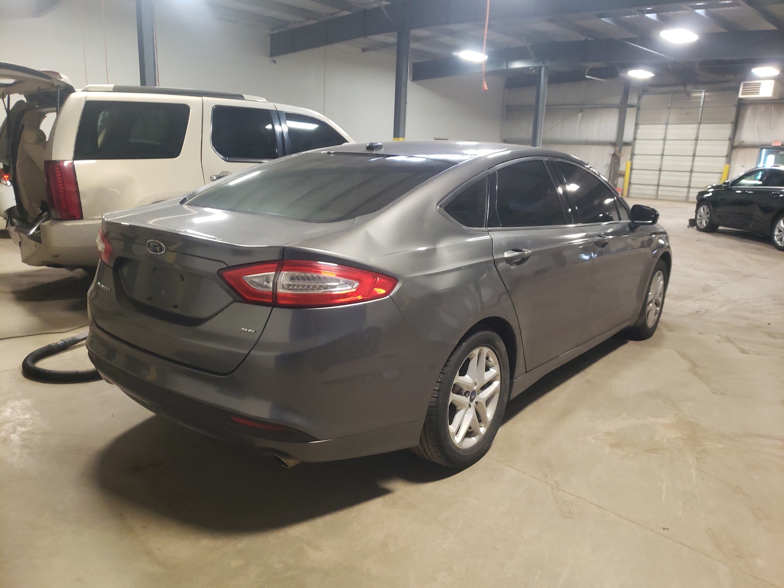 Photo 4 from auction – 2014 FORD FUSION SE with VIN 3FA6P0H75ER159214