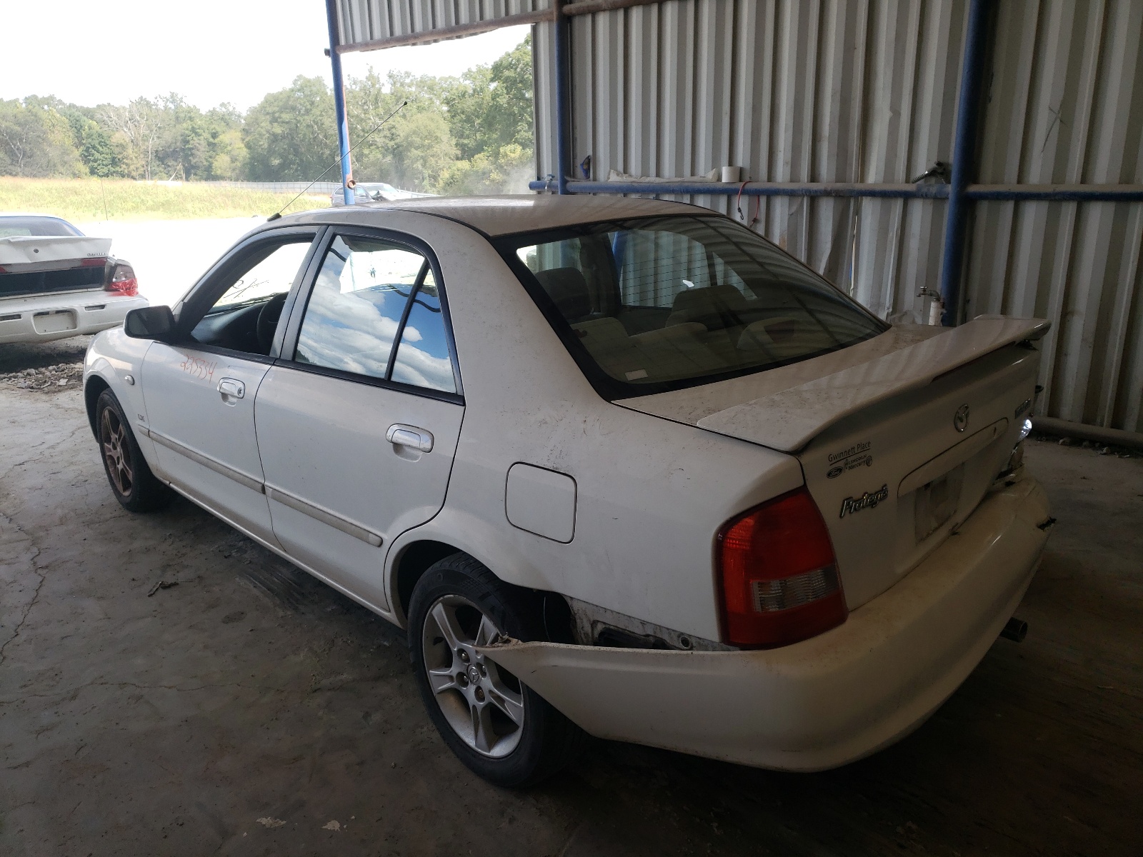 Photo 3 from auction – 2003 MAZDA PROTEGE DX with VIN JM1BJ225X30142127